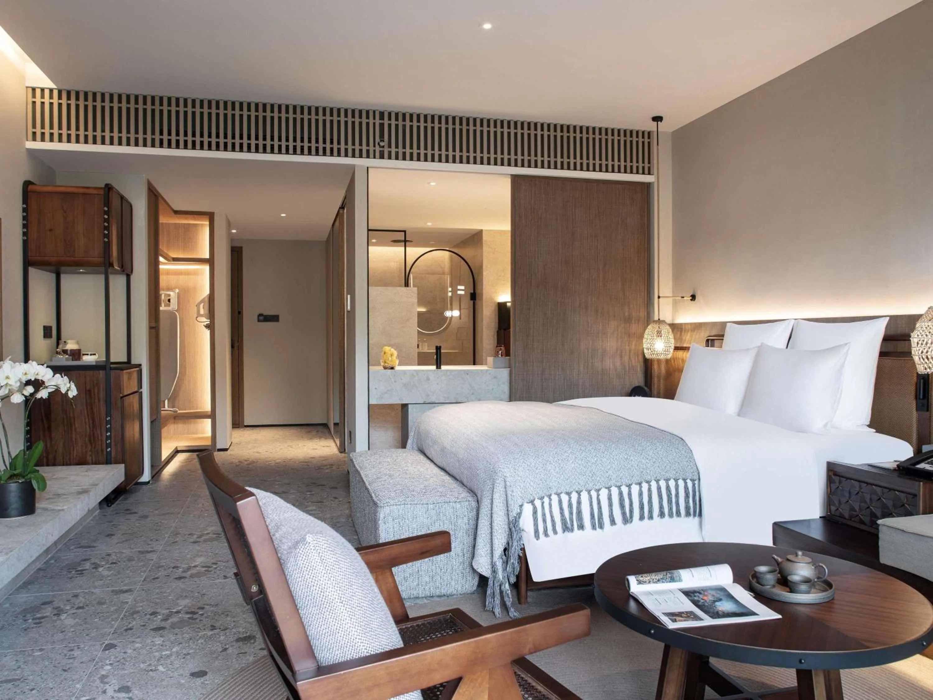 Bedroom, Bed in DongFengYun Hotel Mi'Le - MGallery Collection