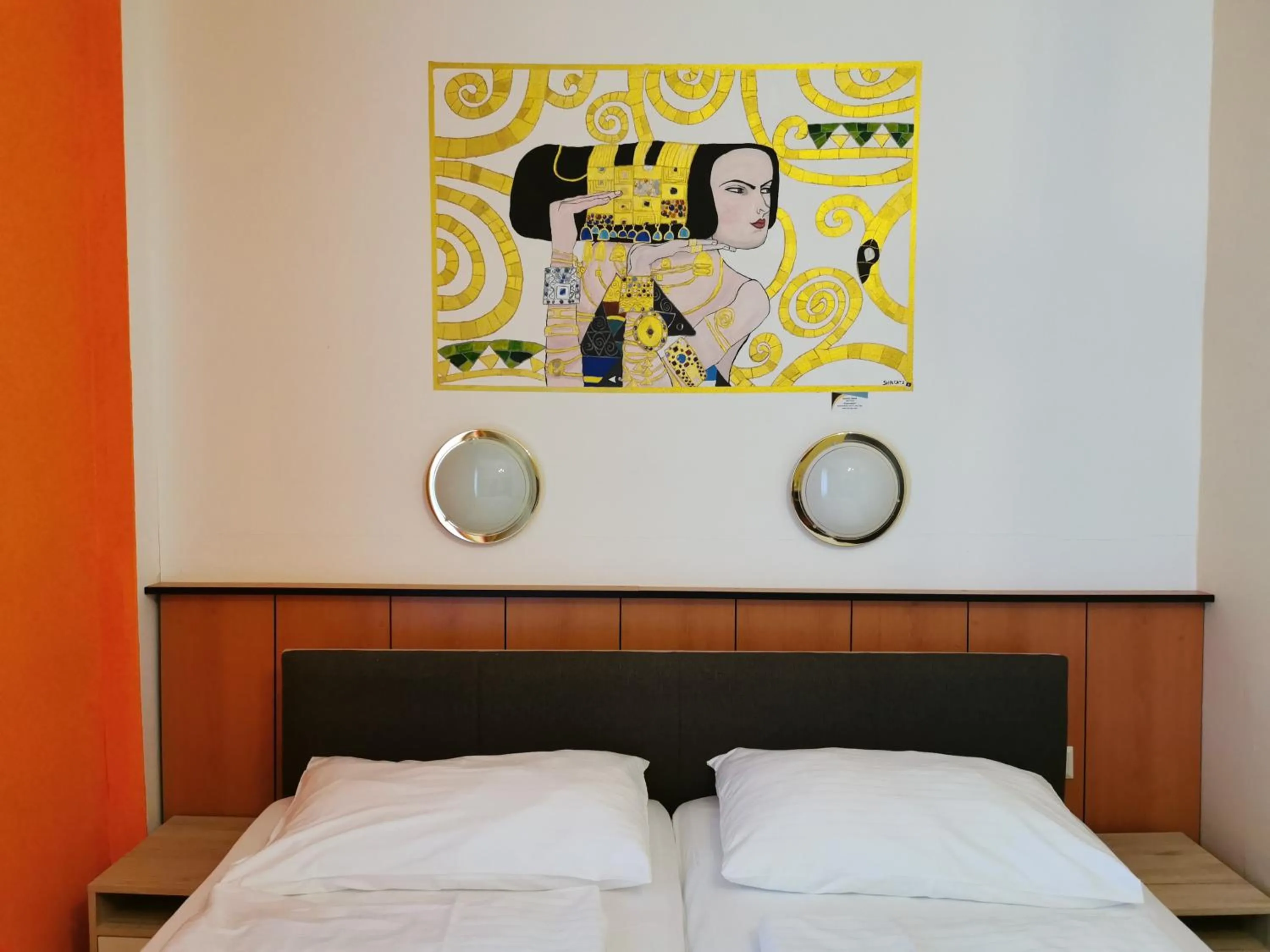 Bed in Garten- und Kunsthotel Gabriel City