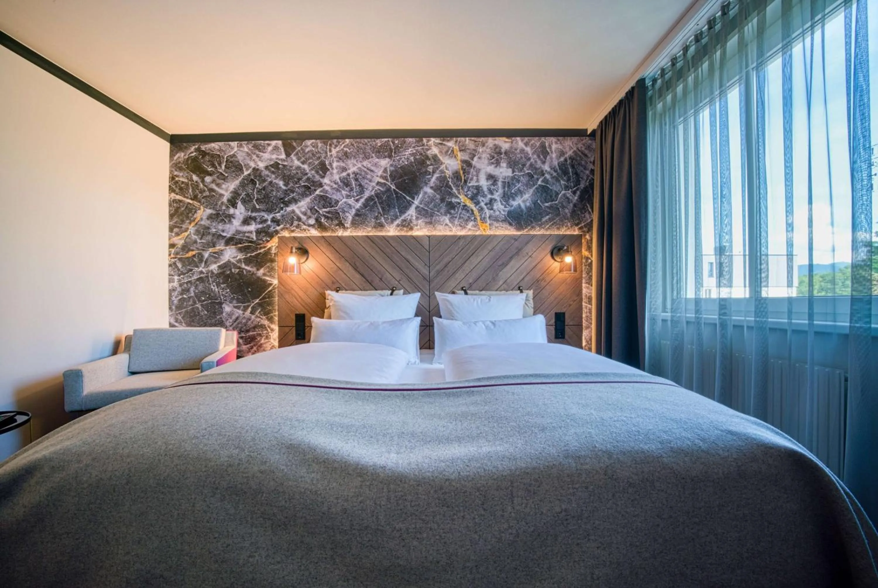 Photo of the whole room, Bed in FourSide Hotel Salzburg Messe, Trademark Collection by Wyndham