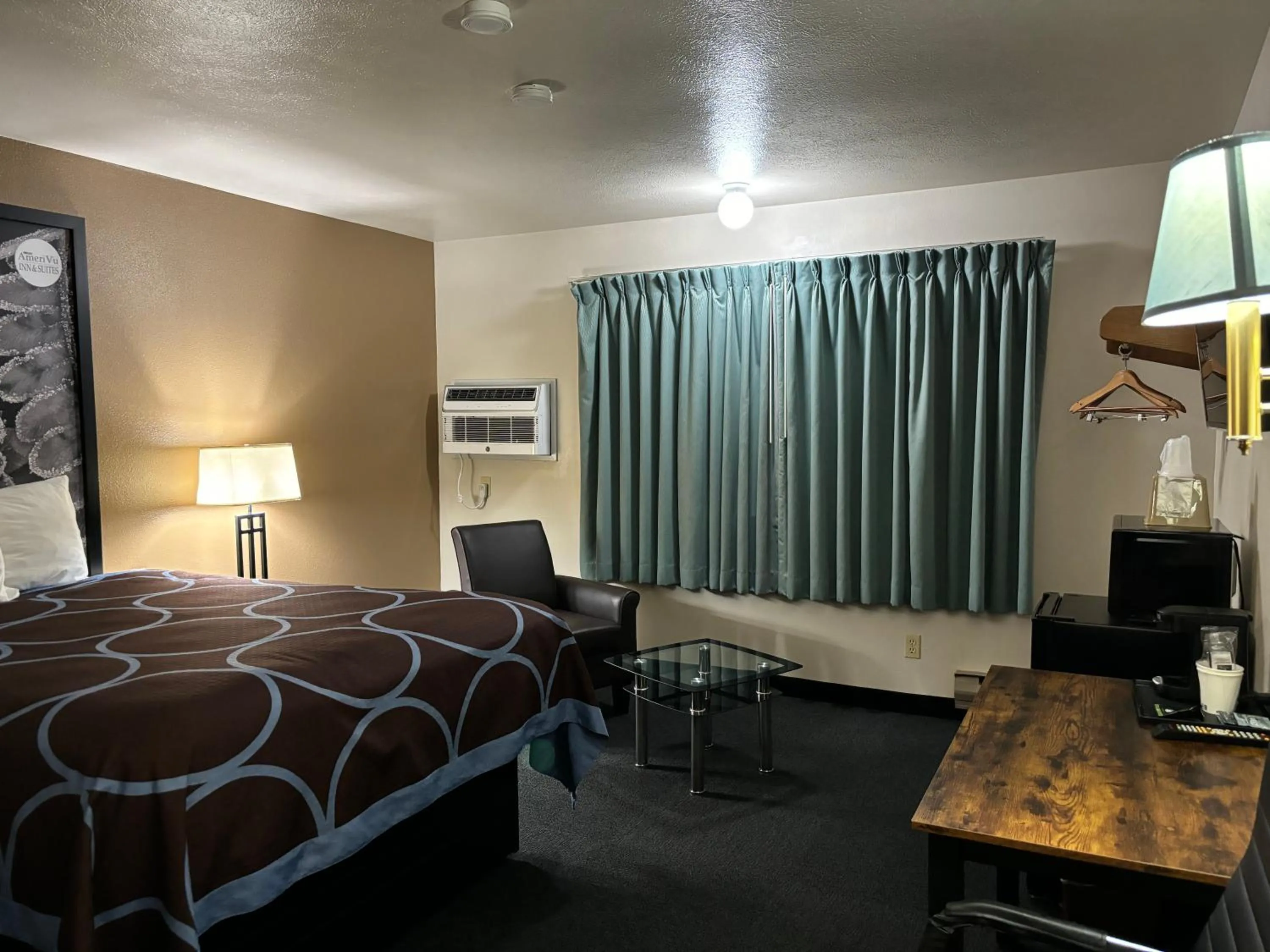 Photo of the whole room, Bed in AmeriVu Inn and Suites Shawano WI