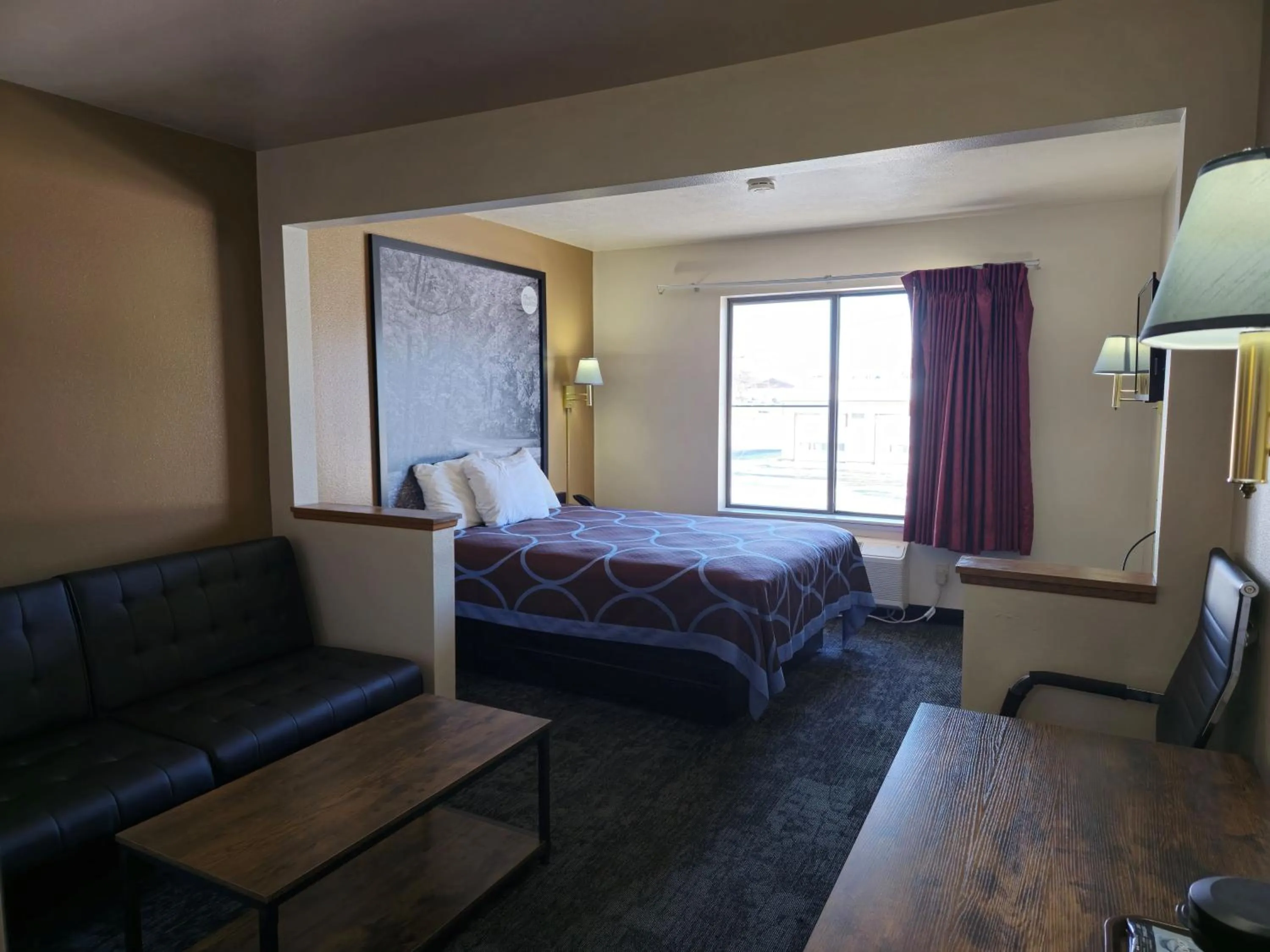 Photo of the whole room, Bed in AmeriVu Inn and Suites Shawano WI