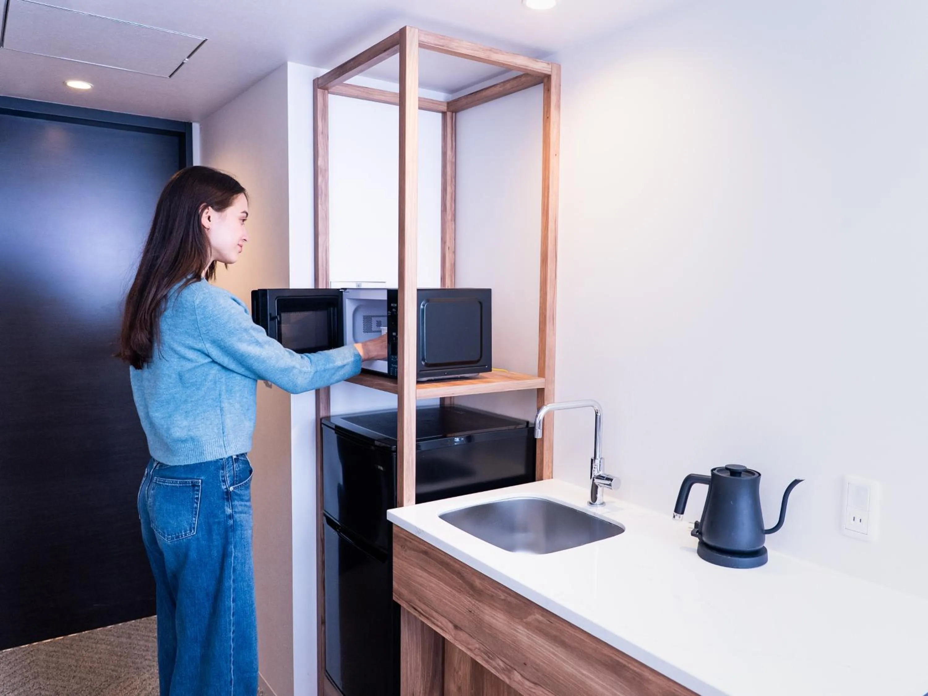 Kitchen or kitchenette in Tokyu Stay Shinjuku Eastside