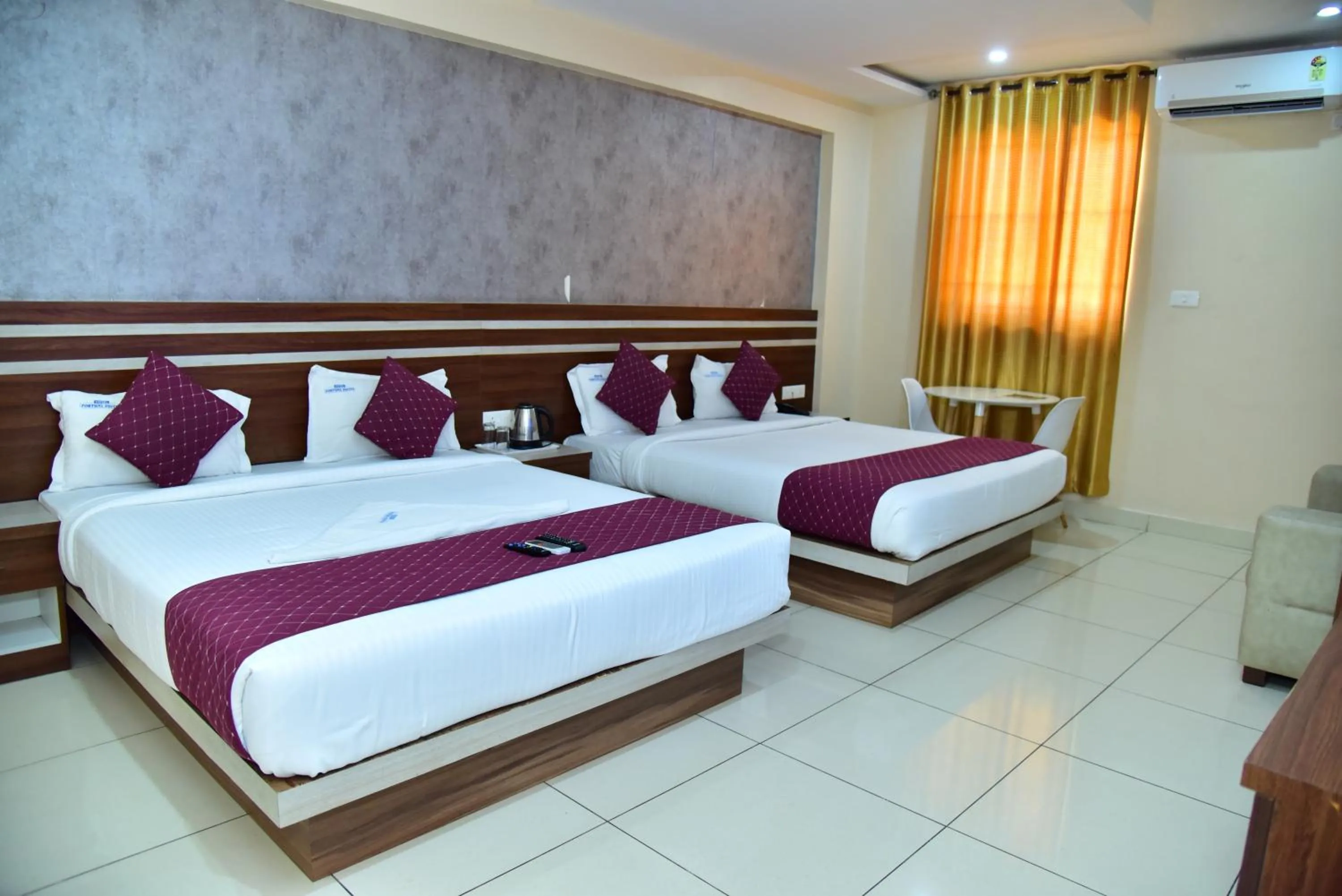 Bed in hotel fortune suites