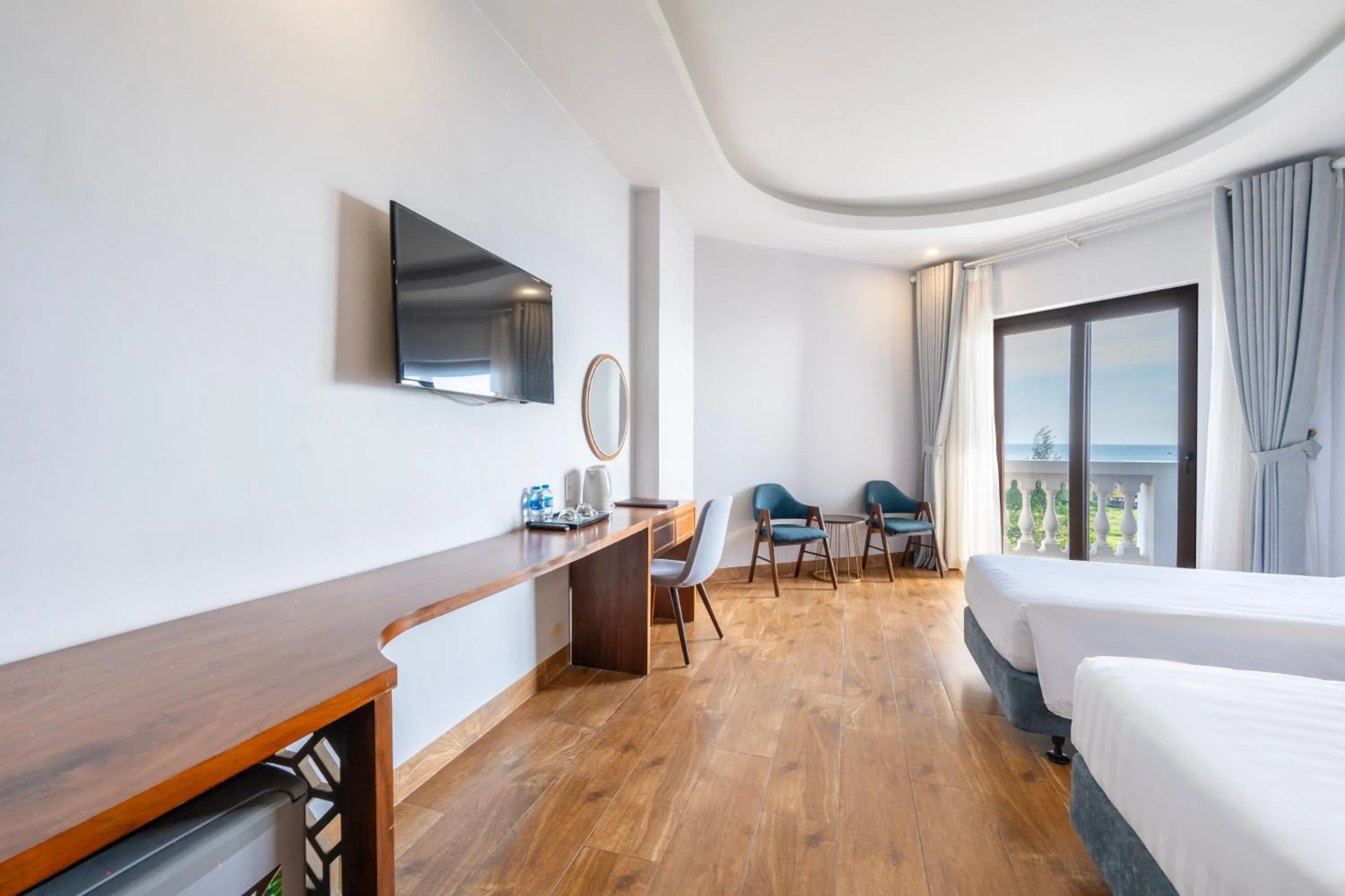 Seating area, Bed in Maris Beach Hotel Phu Quoc