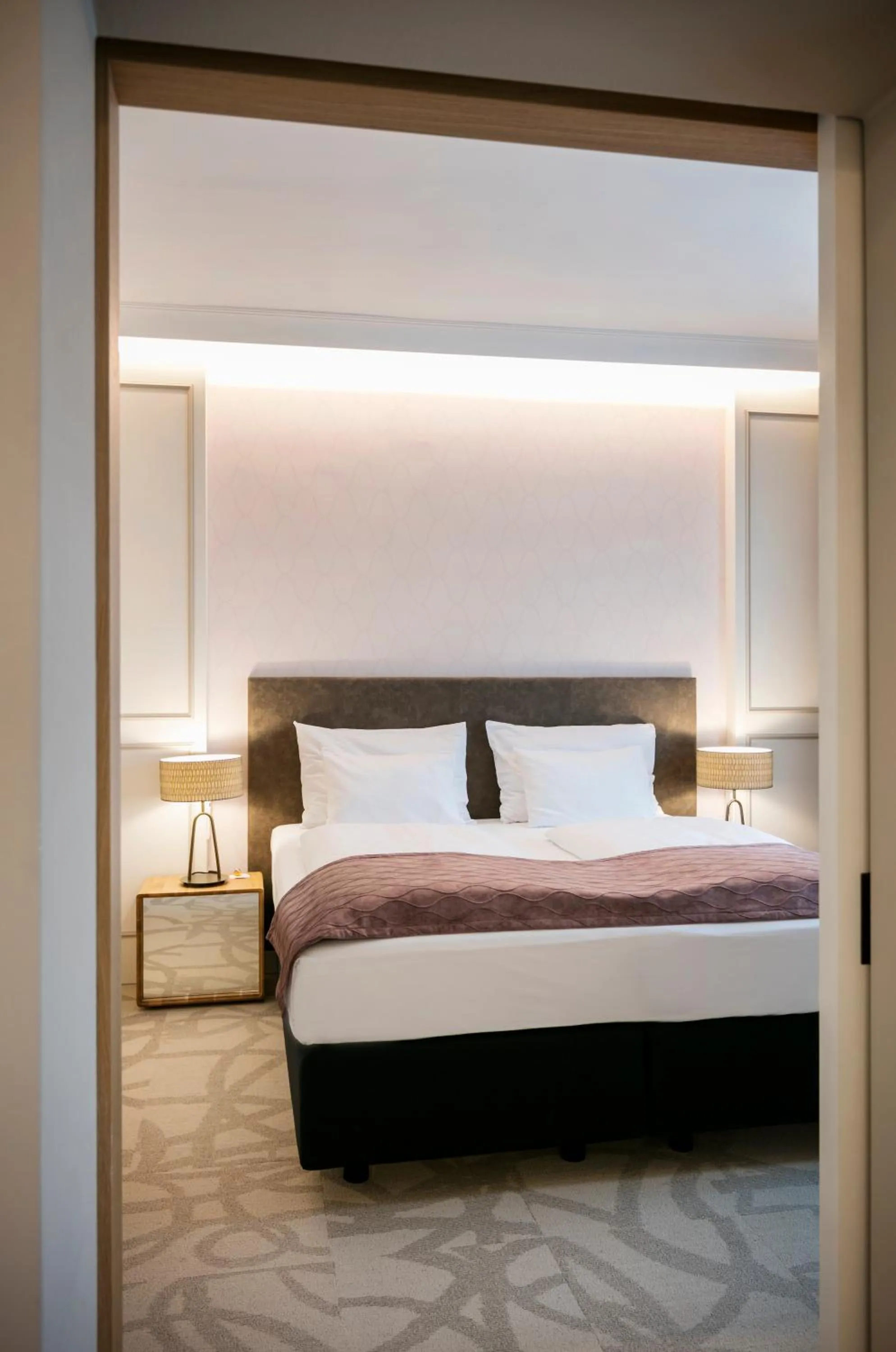 Bed in ARCOTEL Castellani Salzburg