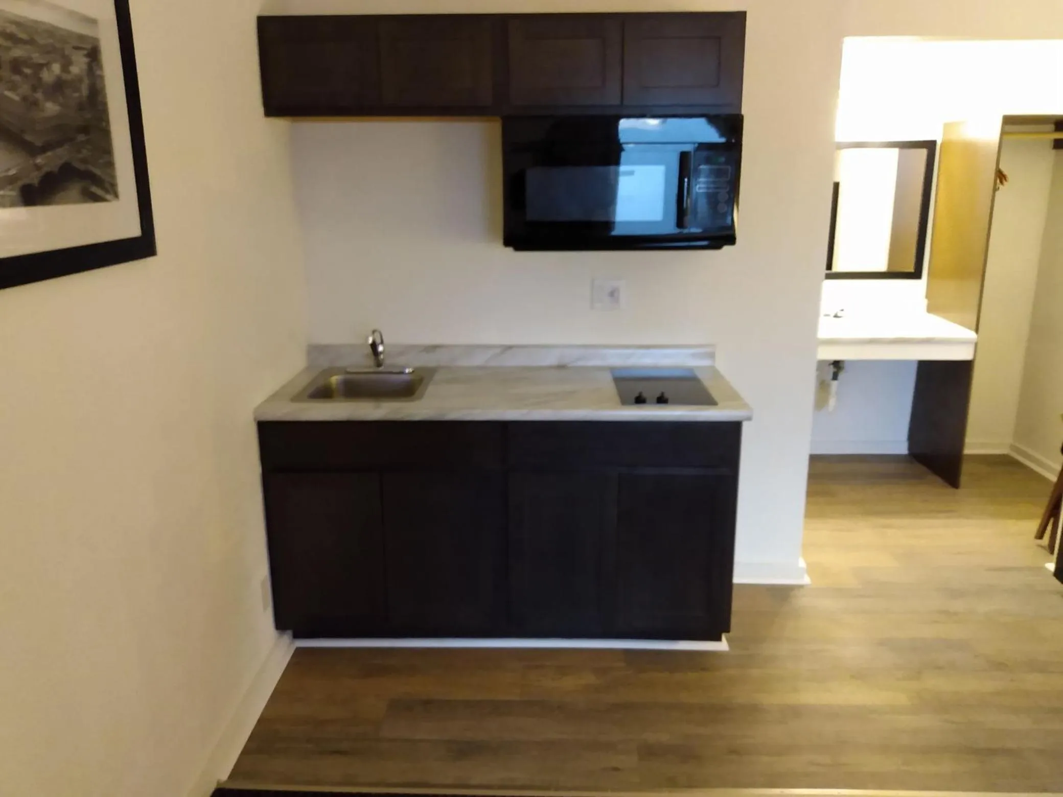 Kitchen or kitchenette in Suburban Studios Brazil