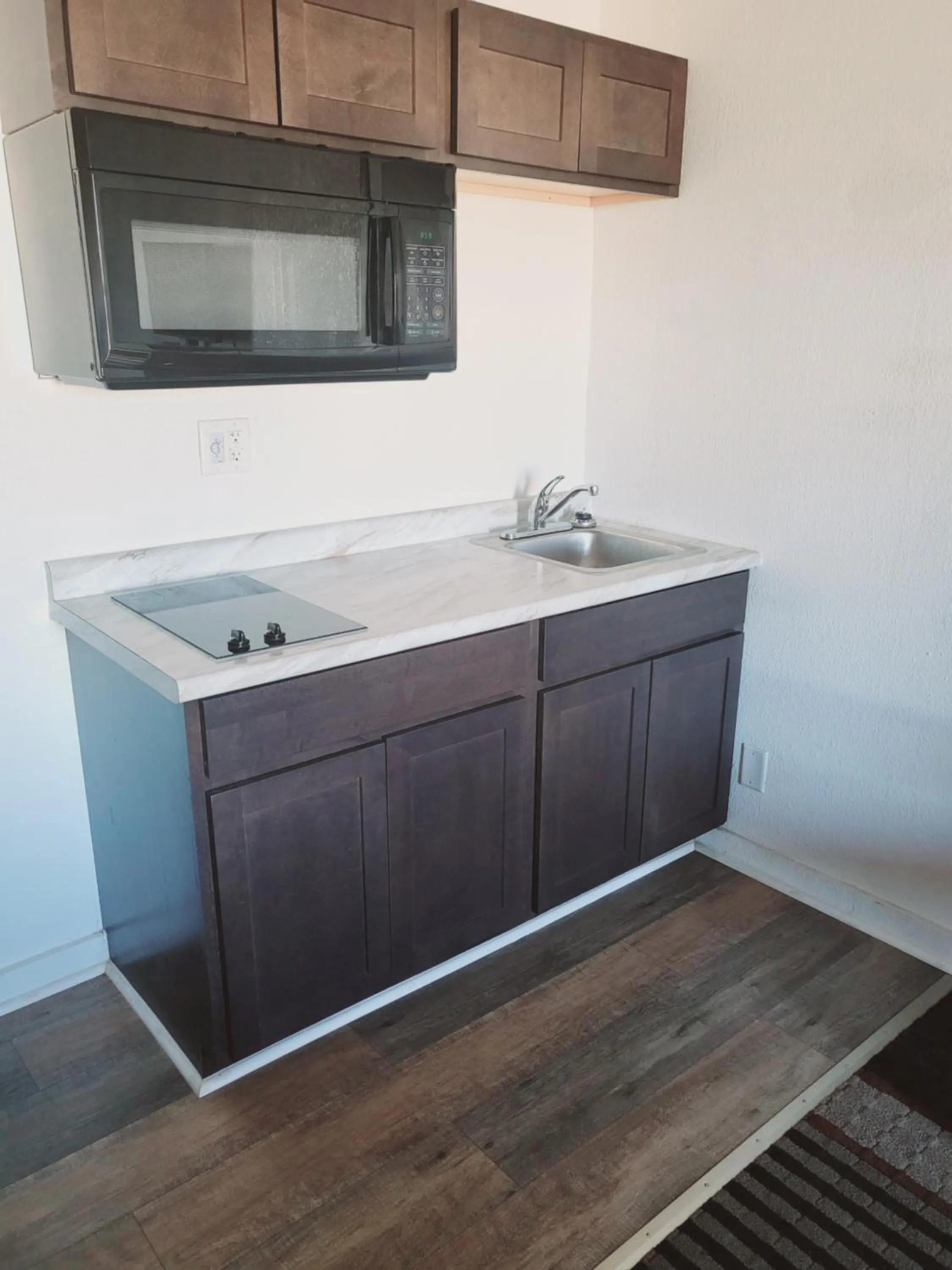 Kitchen or kitchenette in Suburban Studios Brazil