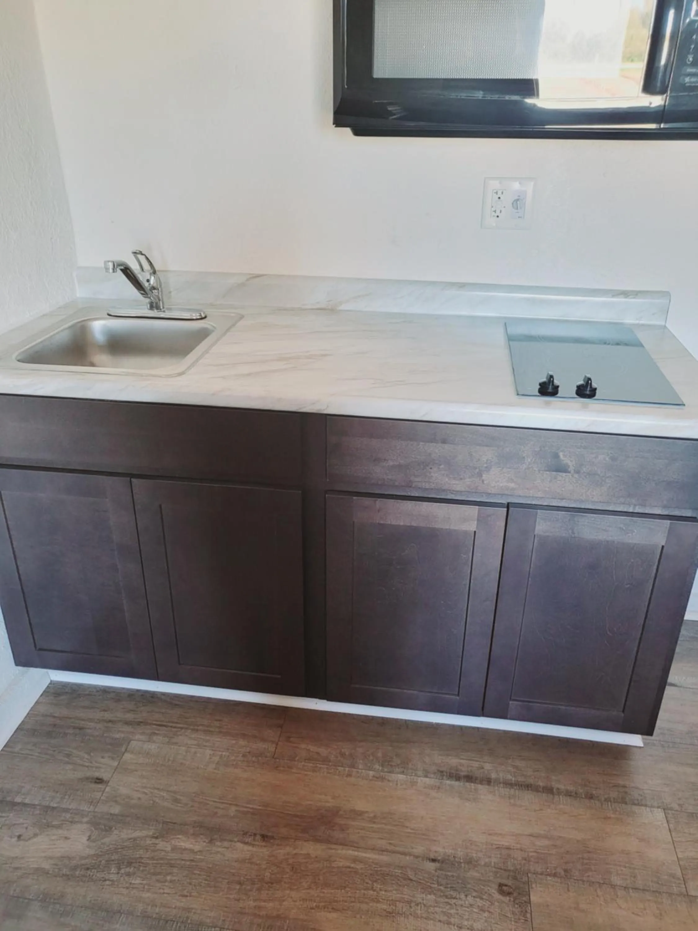 Kitchen or kitchenette in Suburban Studios Brazil