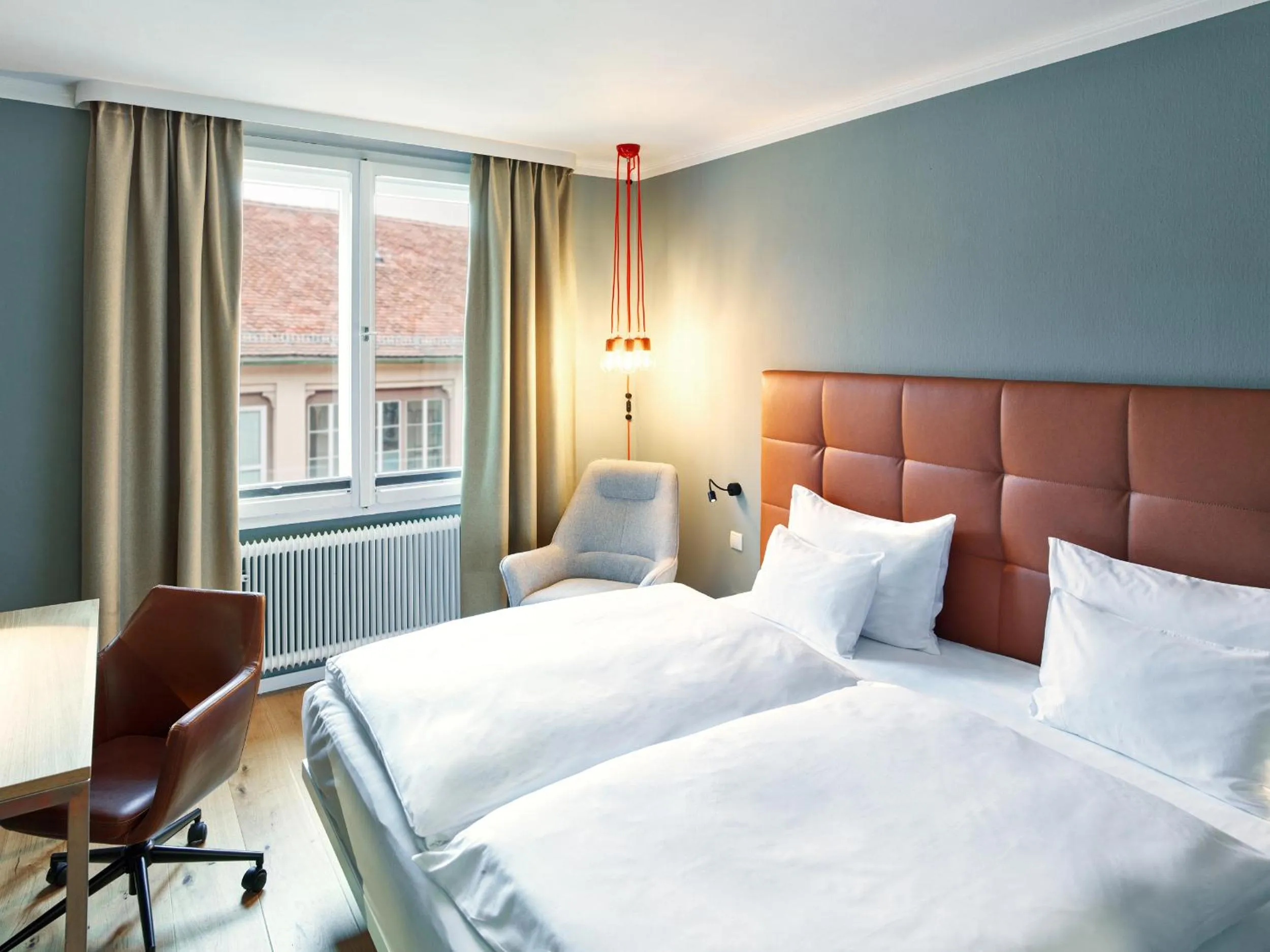Bed in Hotel Weitzer Graz - Centre of Graz