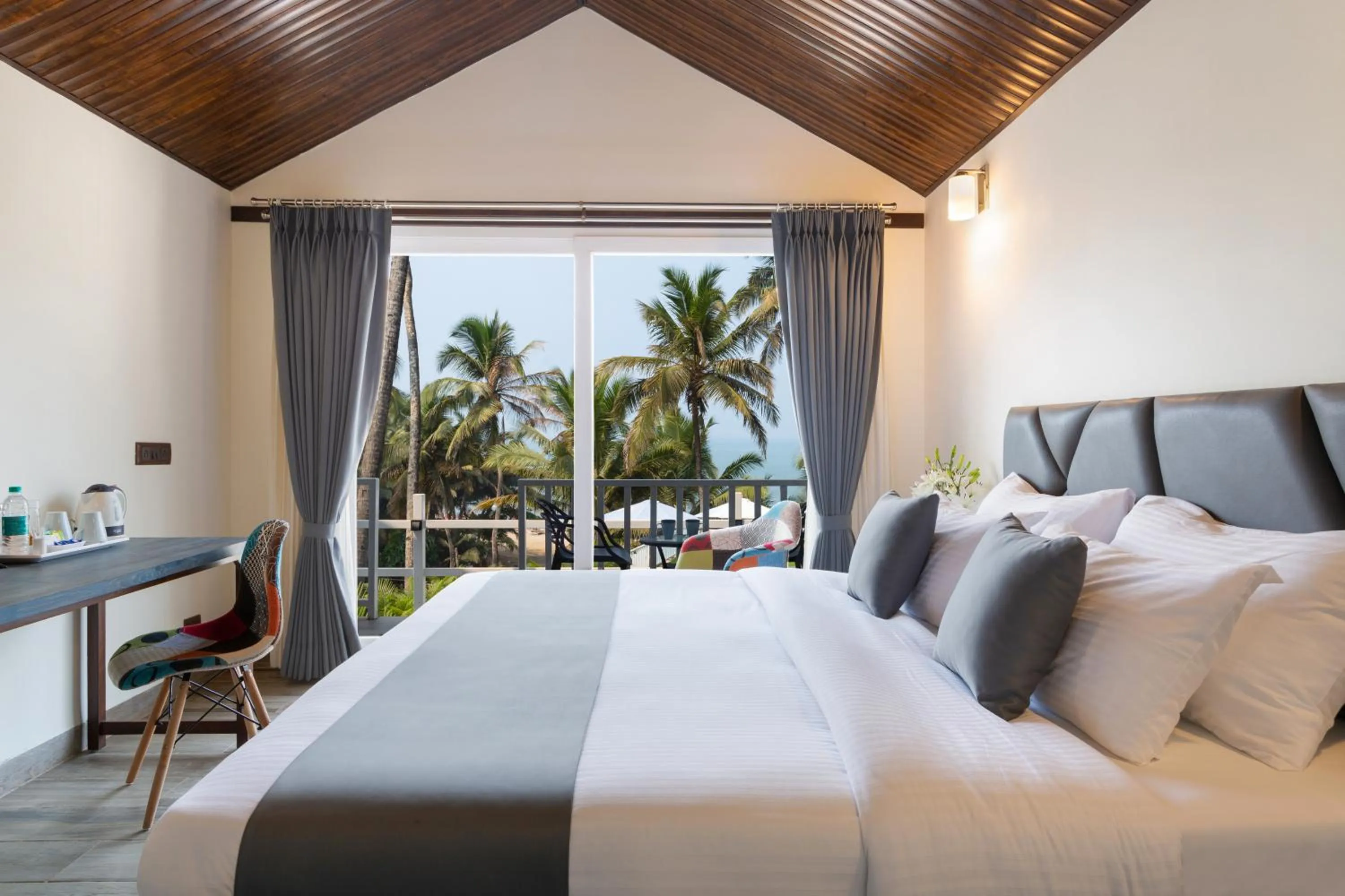 Bed in Stone Wood Beach Resort, Vagator