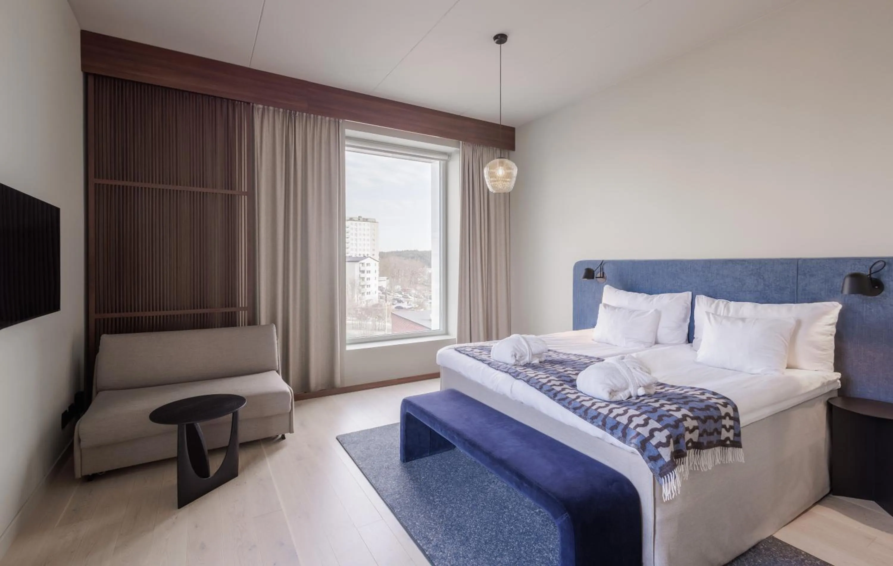 Bed in Clarion Collection Hotel Tapetfabriken