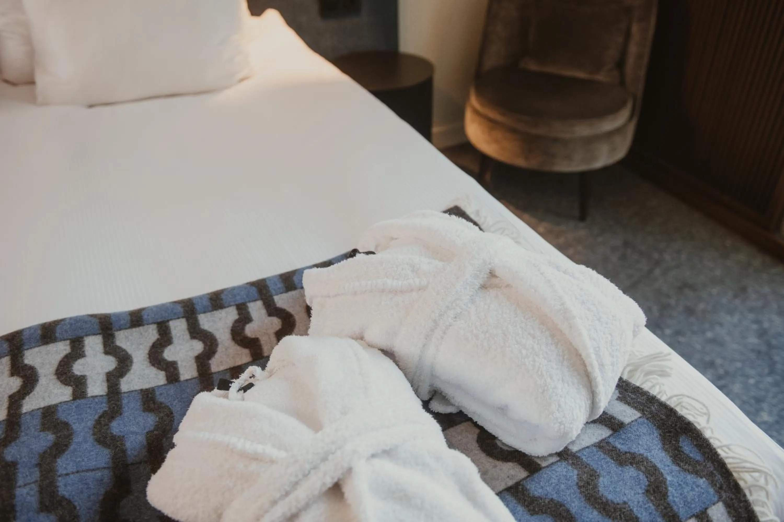 towels, Bed in Home Hotel Tapetfabriken
