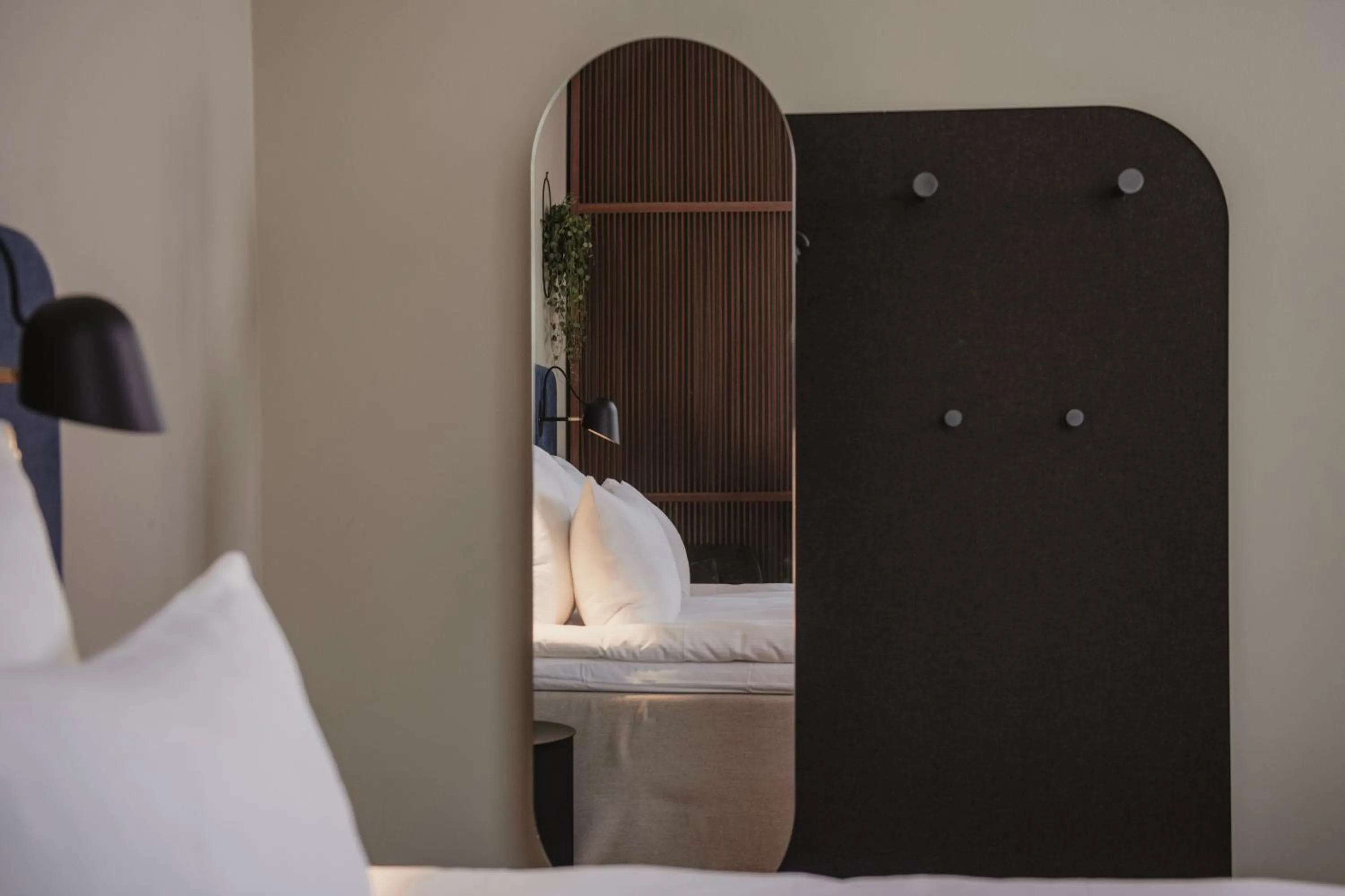 Bed in Home Hotel Tapetfabriken