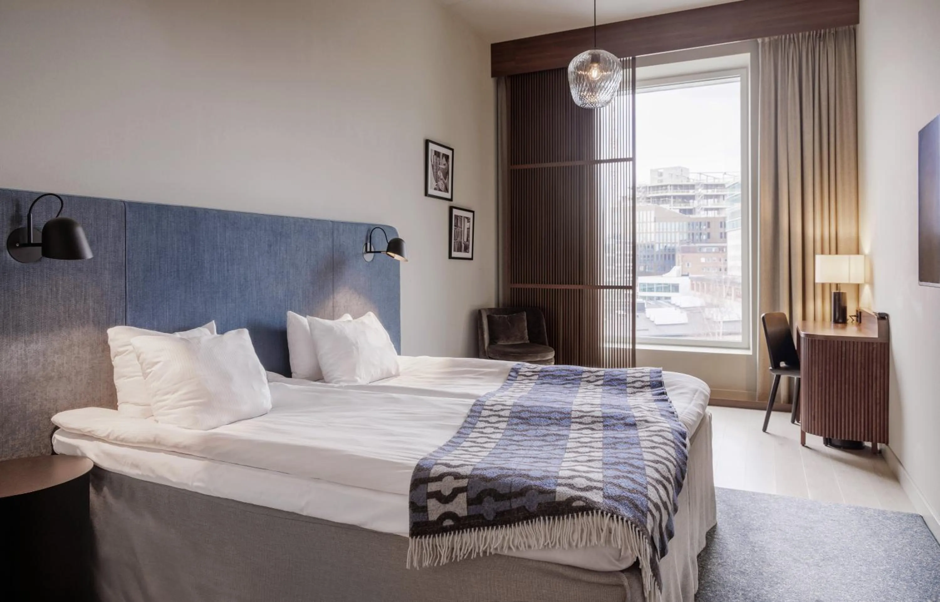 Bed in Clarion Collection Hotel Tapetfabriken