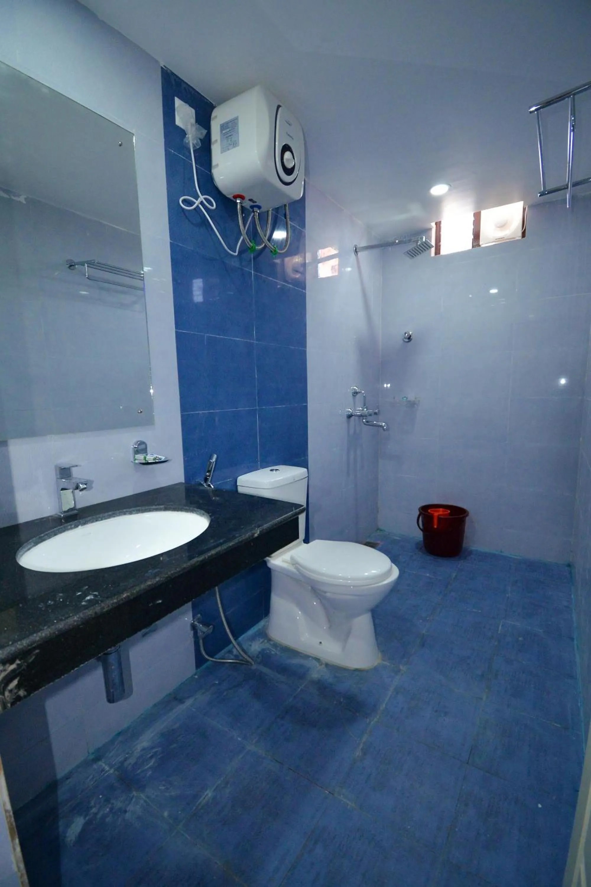 Bathroom in HOTEL CORAL INN -HCI