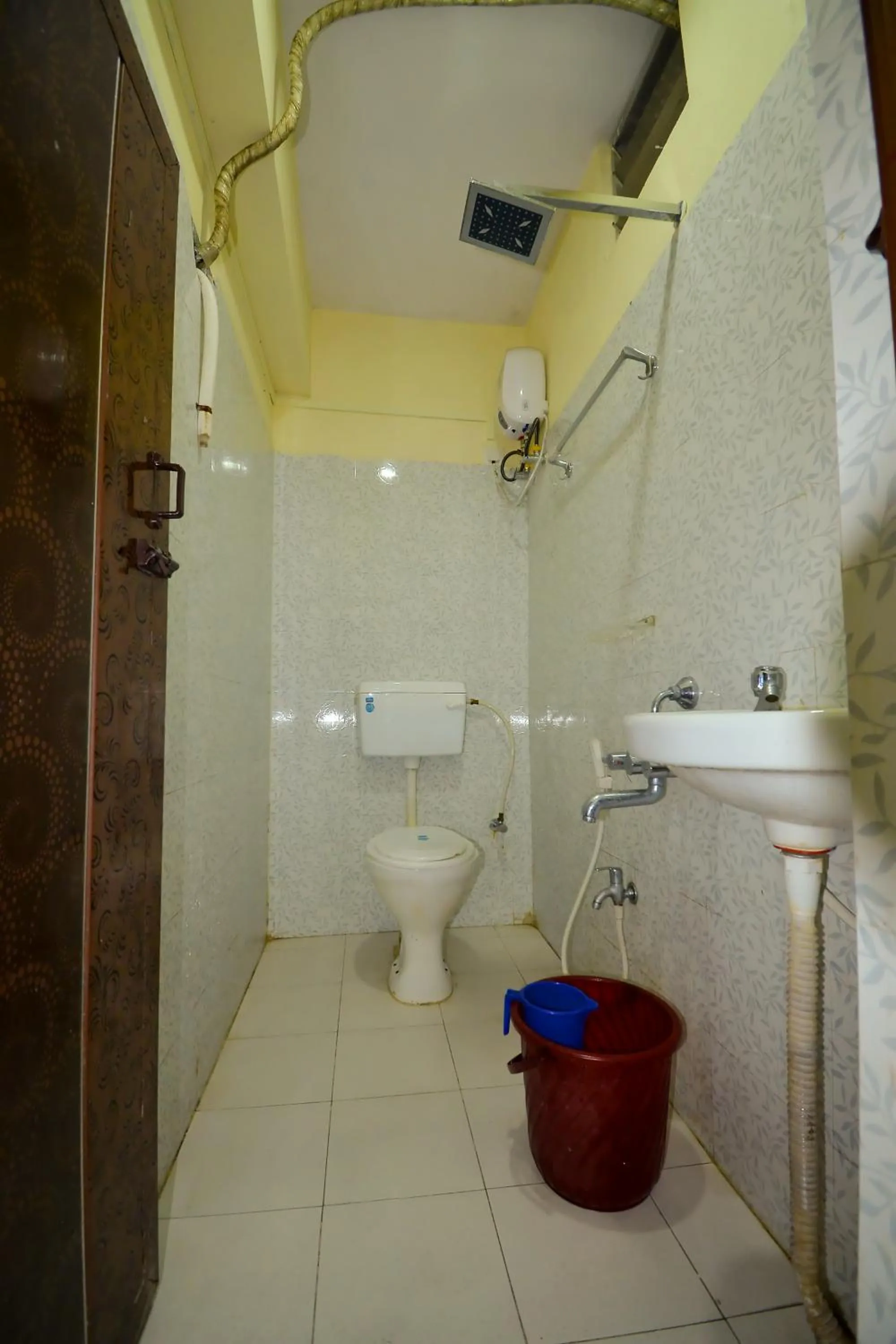 Bathroom in HOTEL CORAL INN -HCI