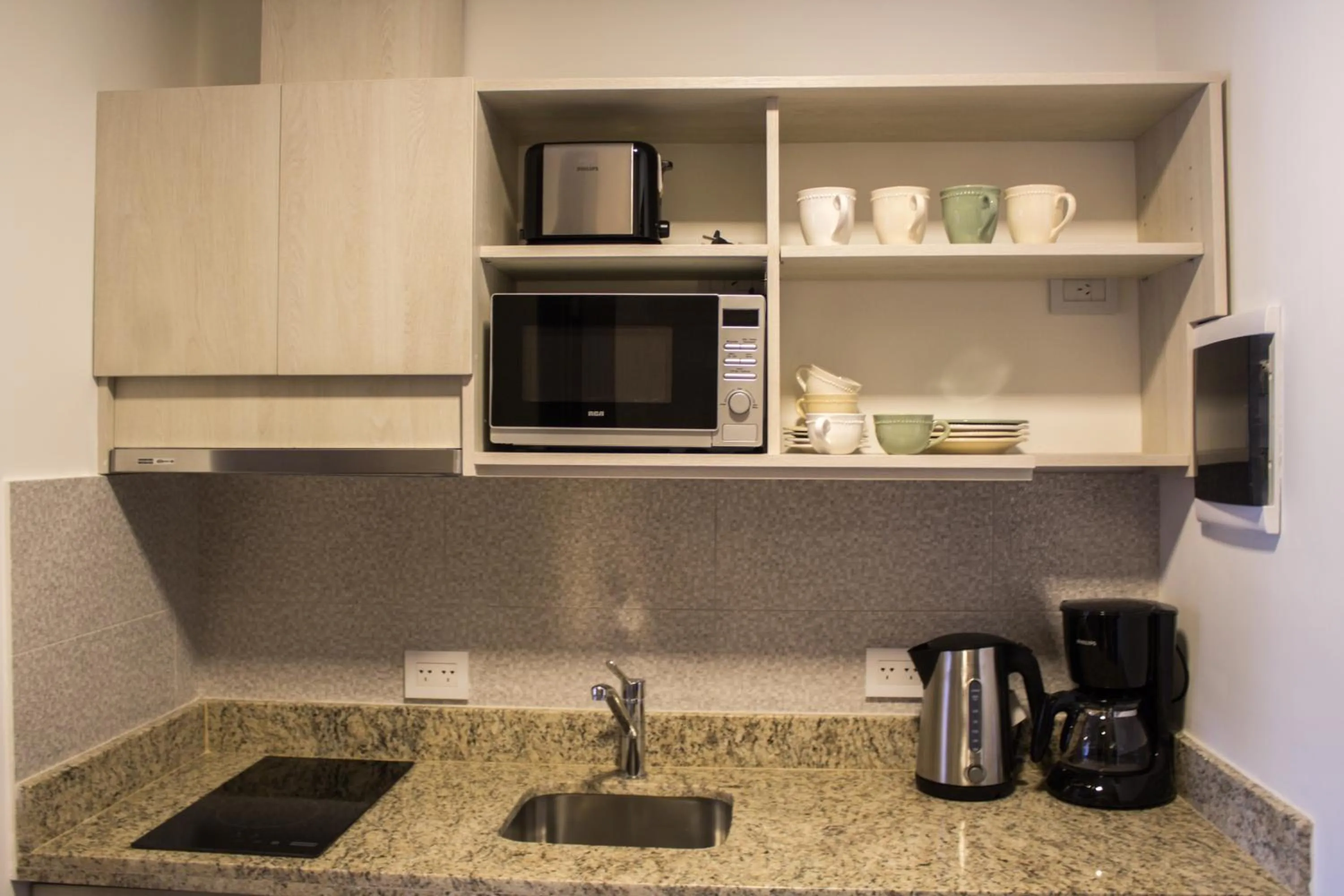 Kitchen or kitchenette in AWKA Apart Hotel