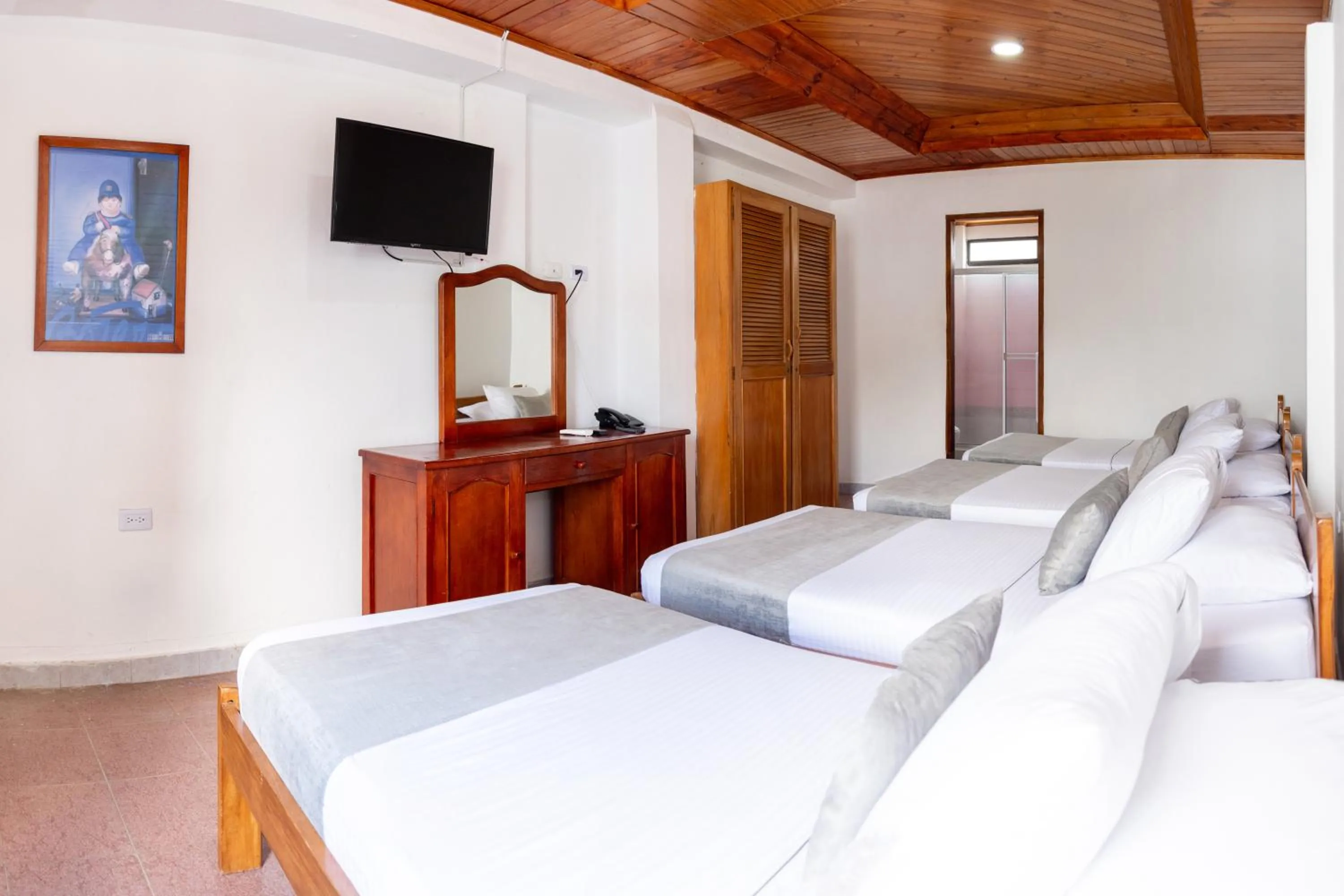 Photo of the whole room, Bed in Hotel Corozal Plaza