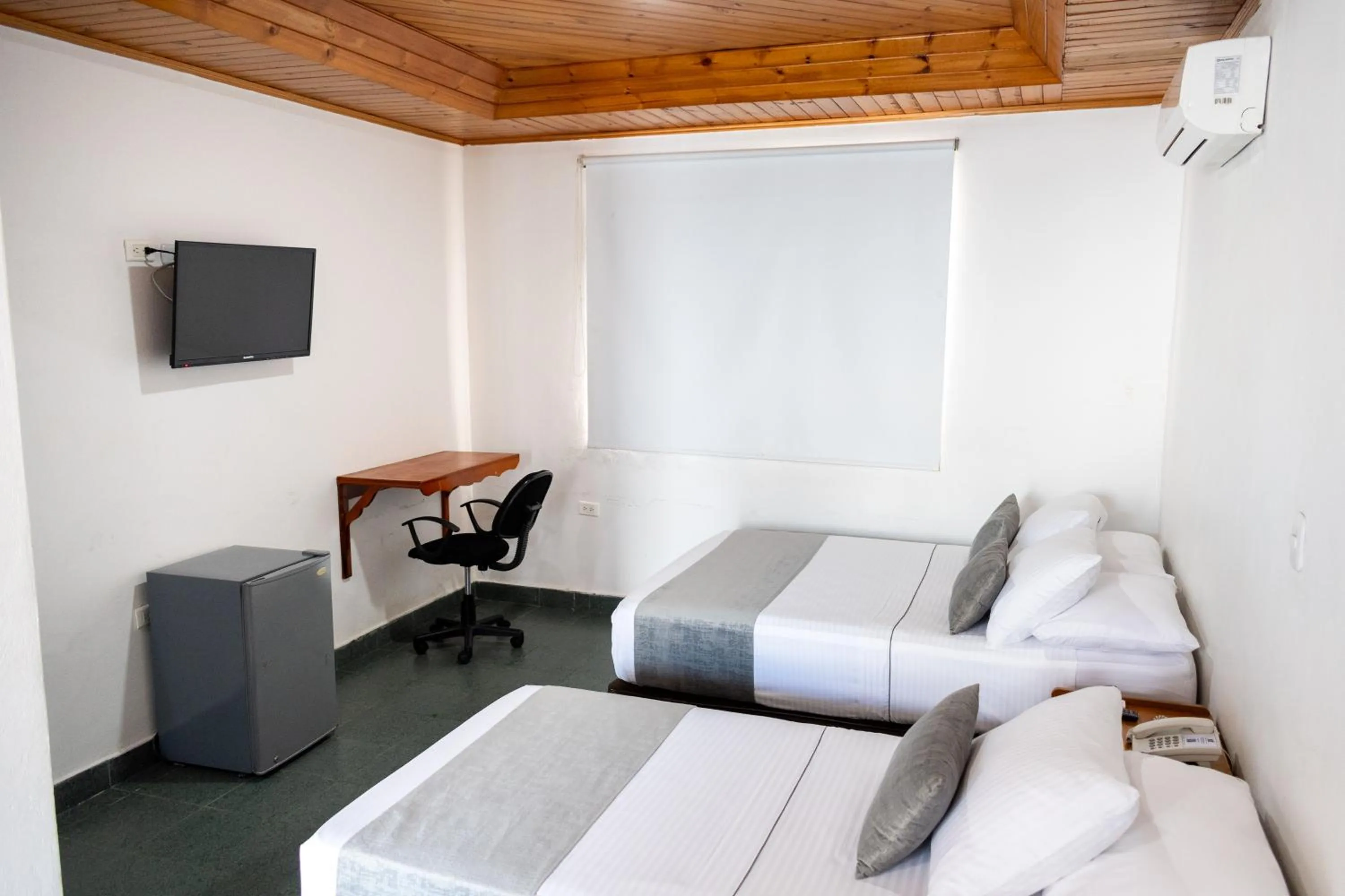 Photo of the whole room, Bed in Hotel Corozal Plaza