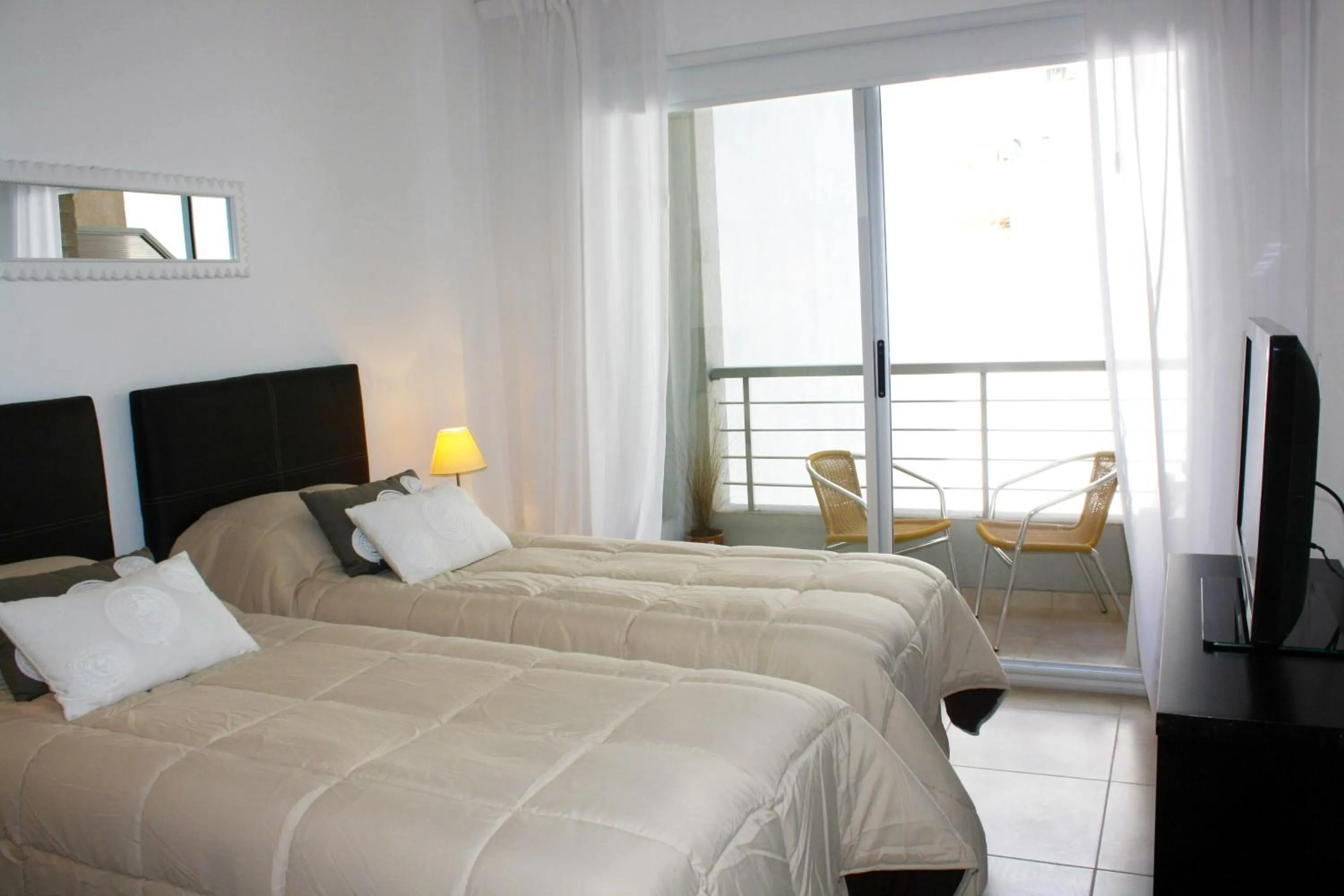 Bed in Arenales Suites