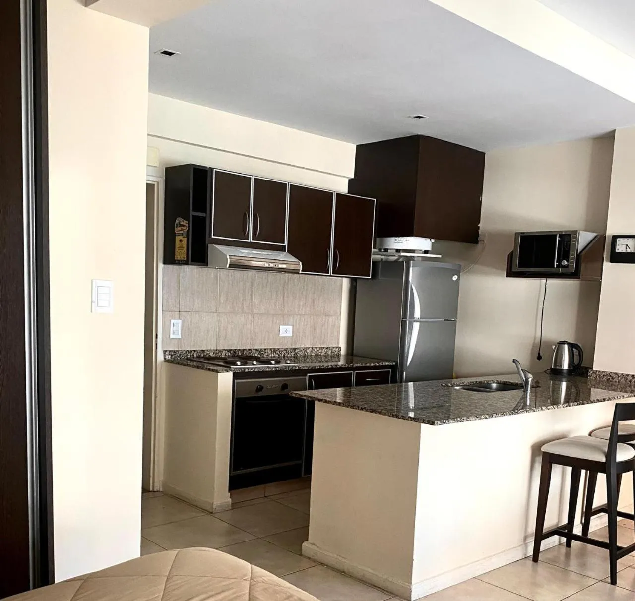 Kitchen or kitchenette in Arenales Suites