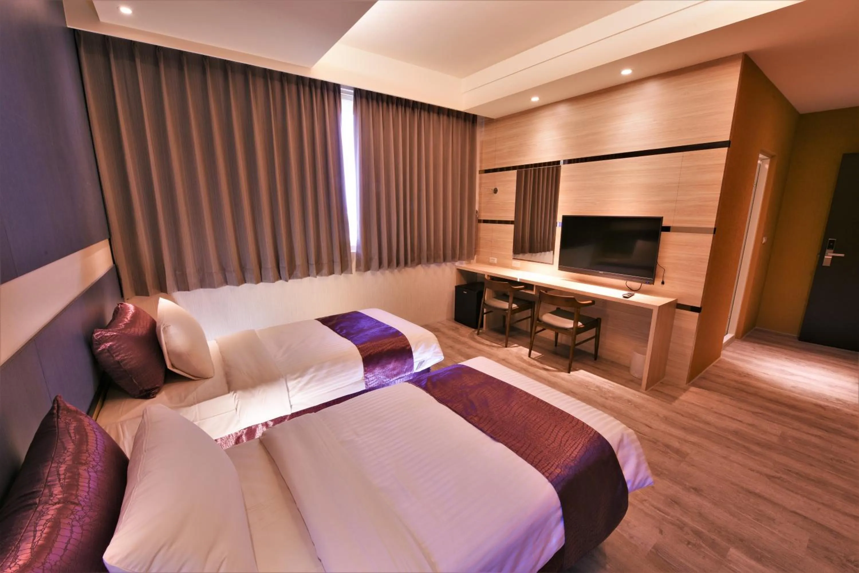 Bed in Yu Kun Tien Hotel