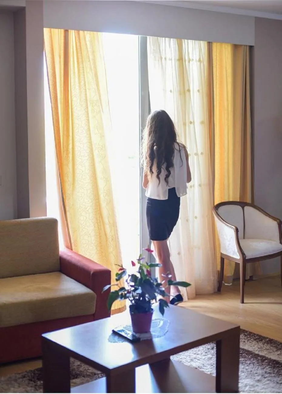 Bedroom in Perla Hotel