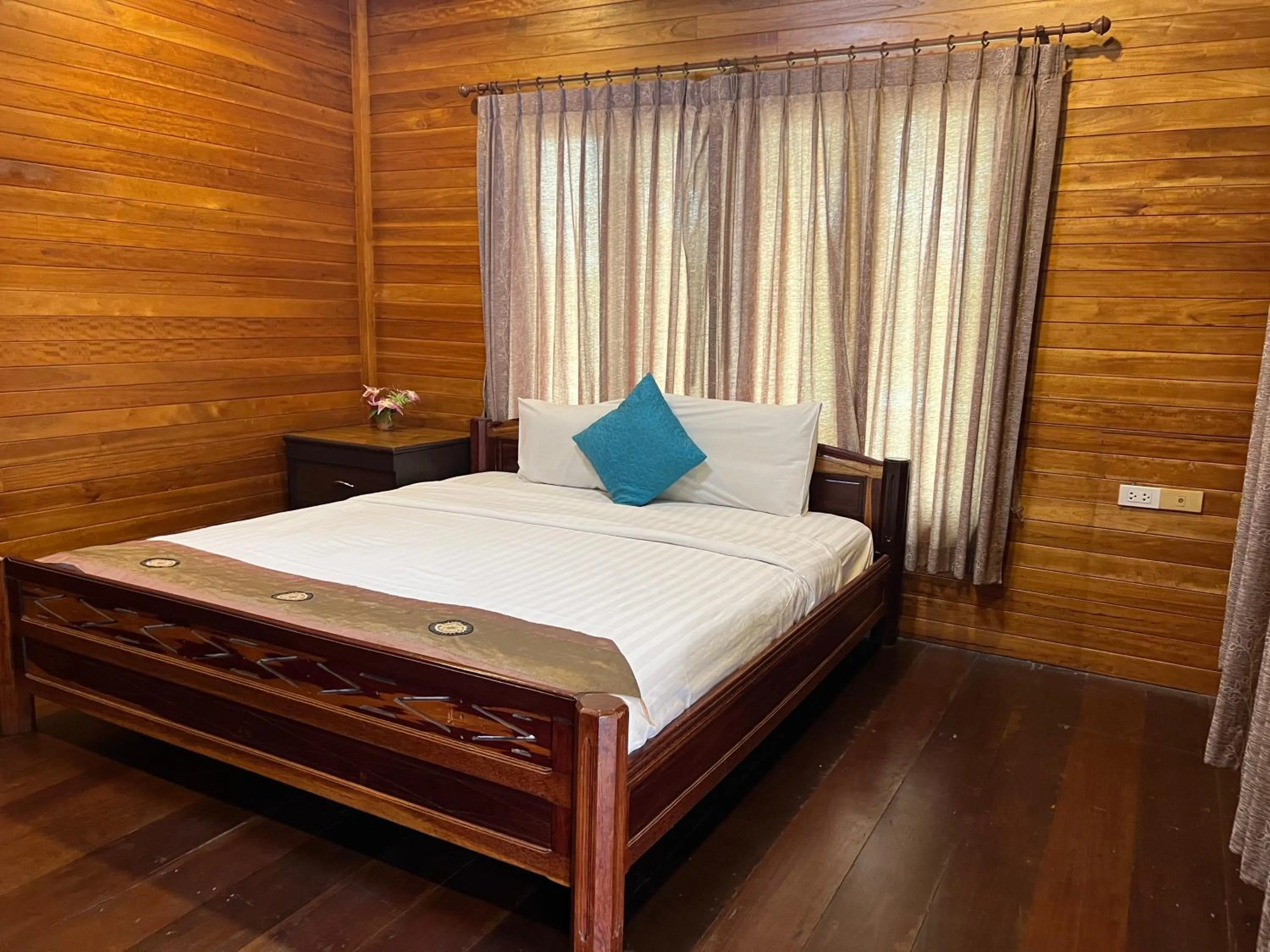 Photo of the whole room, Bed in Siri Lagoona Resort