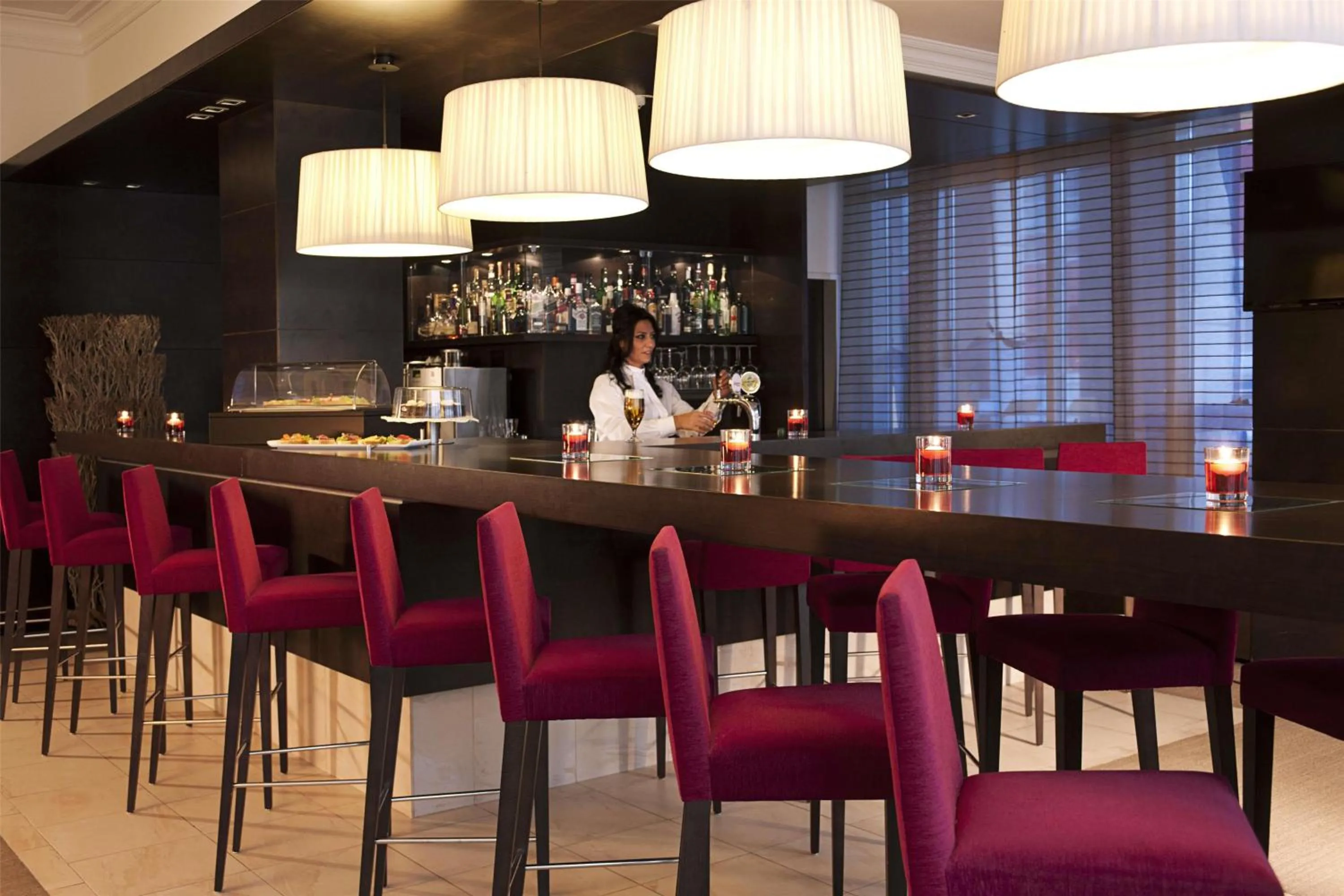 Lounge or bar in NH Vienna Airport Conference Center