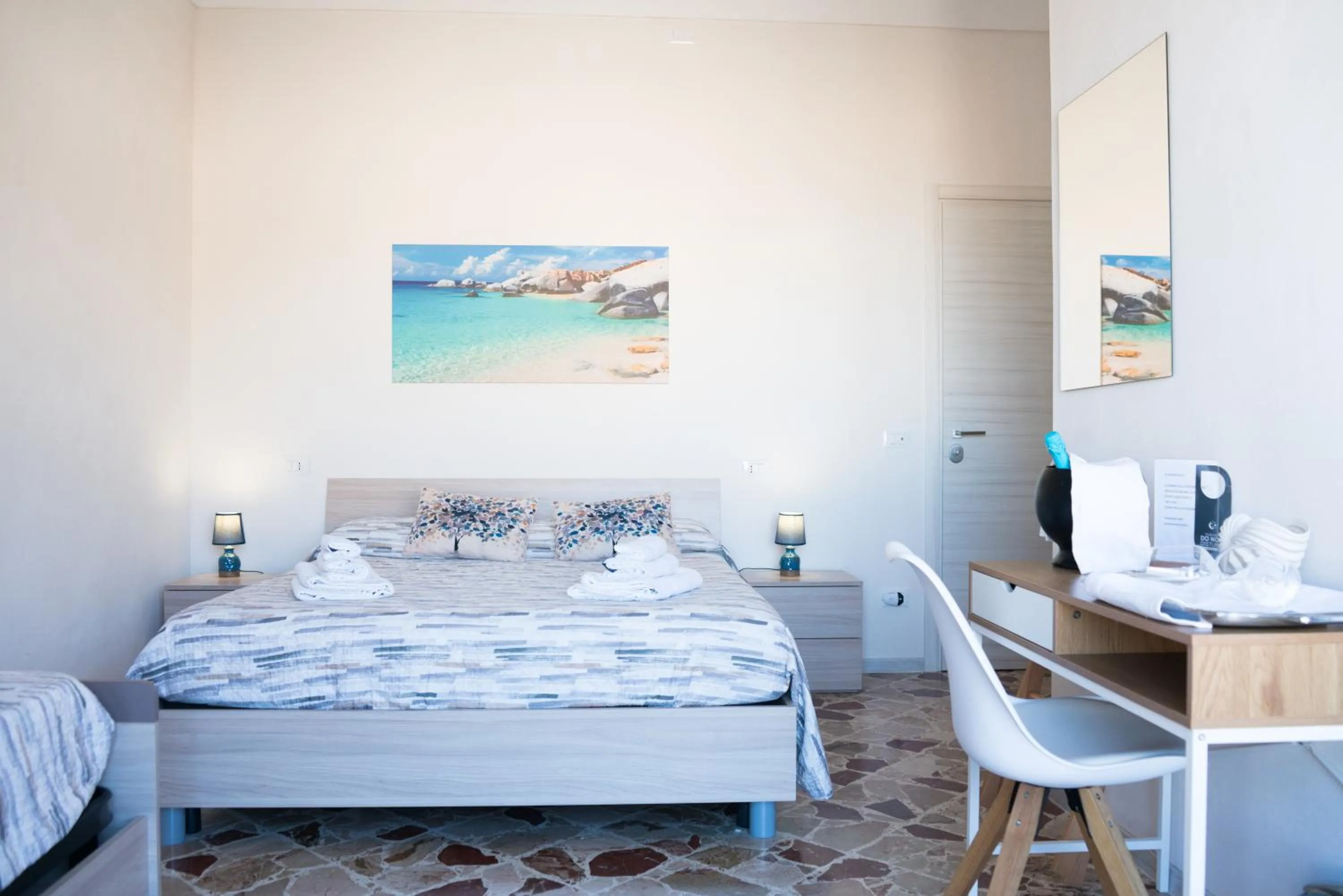 Bed in Ponente & Maestro Rooms