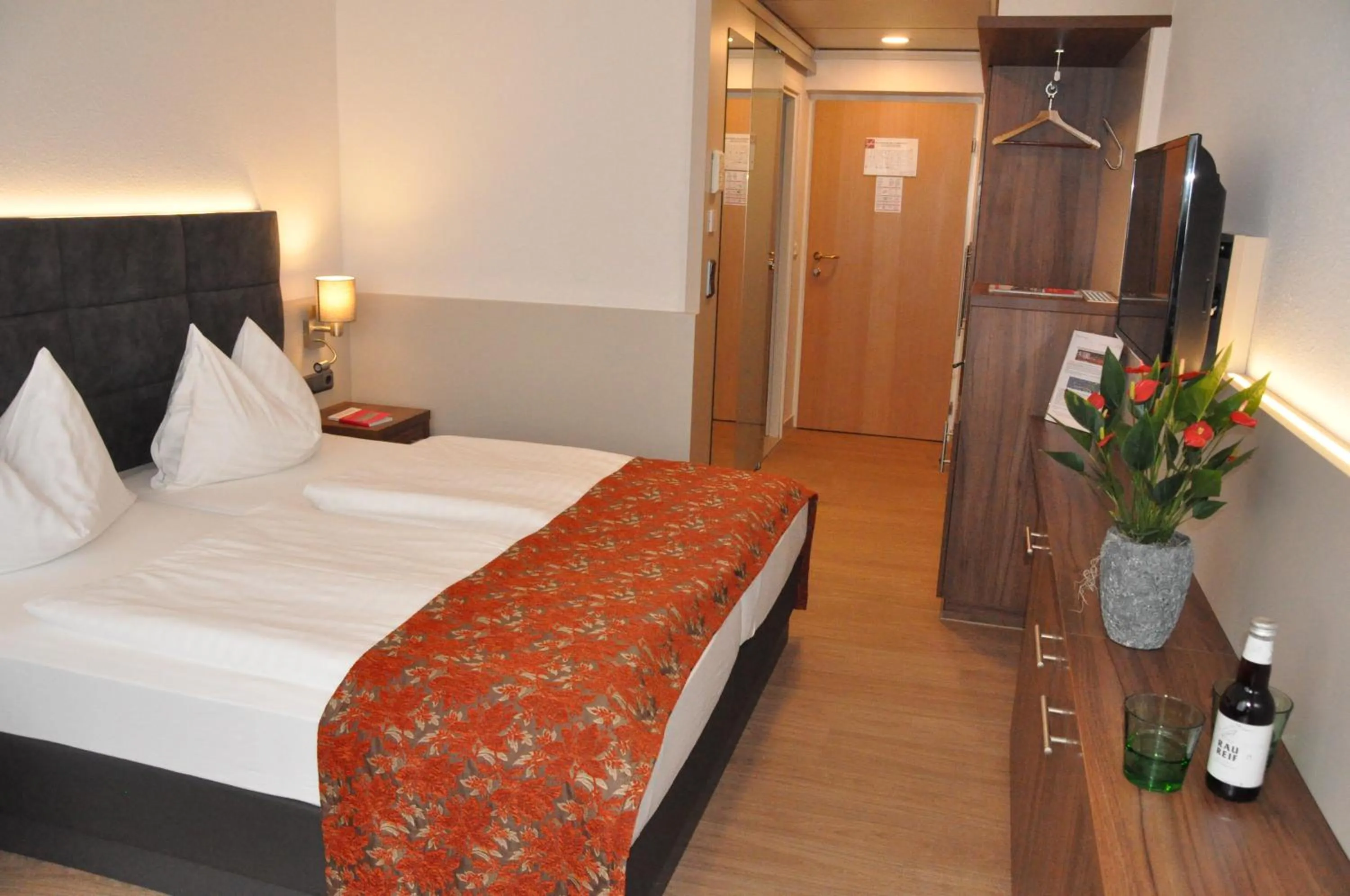 Photo of the whole room, Bed in Stadtoase Kolping Hotel