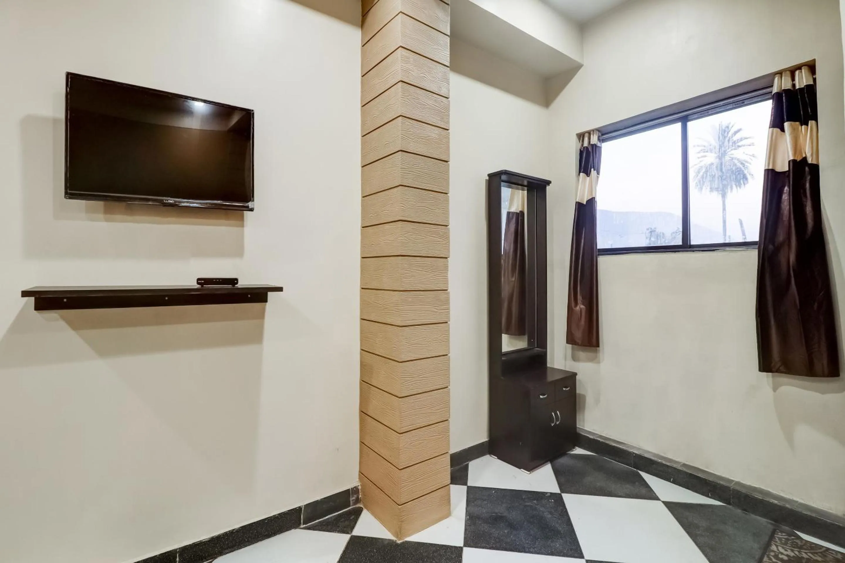 Bedroom in Hotel O Mini Punjab Hills