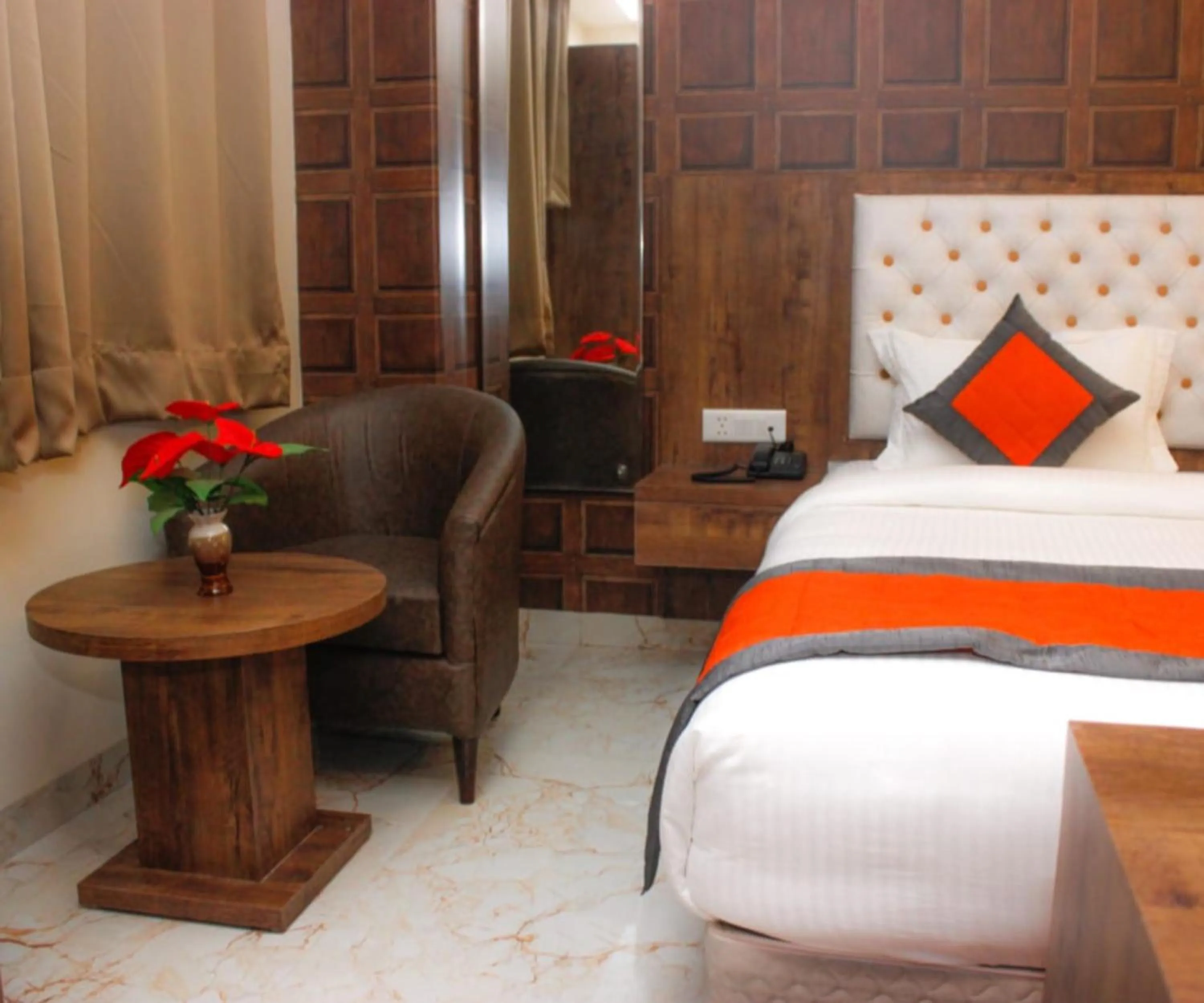 Seating area, Bed in Mayda Inn- A Boutique Hotel