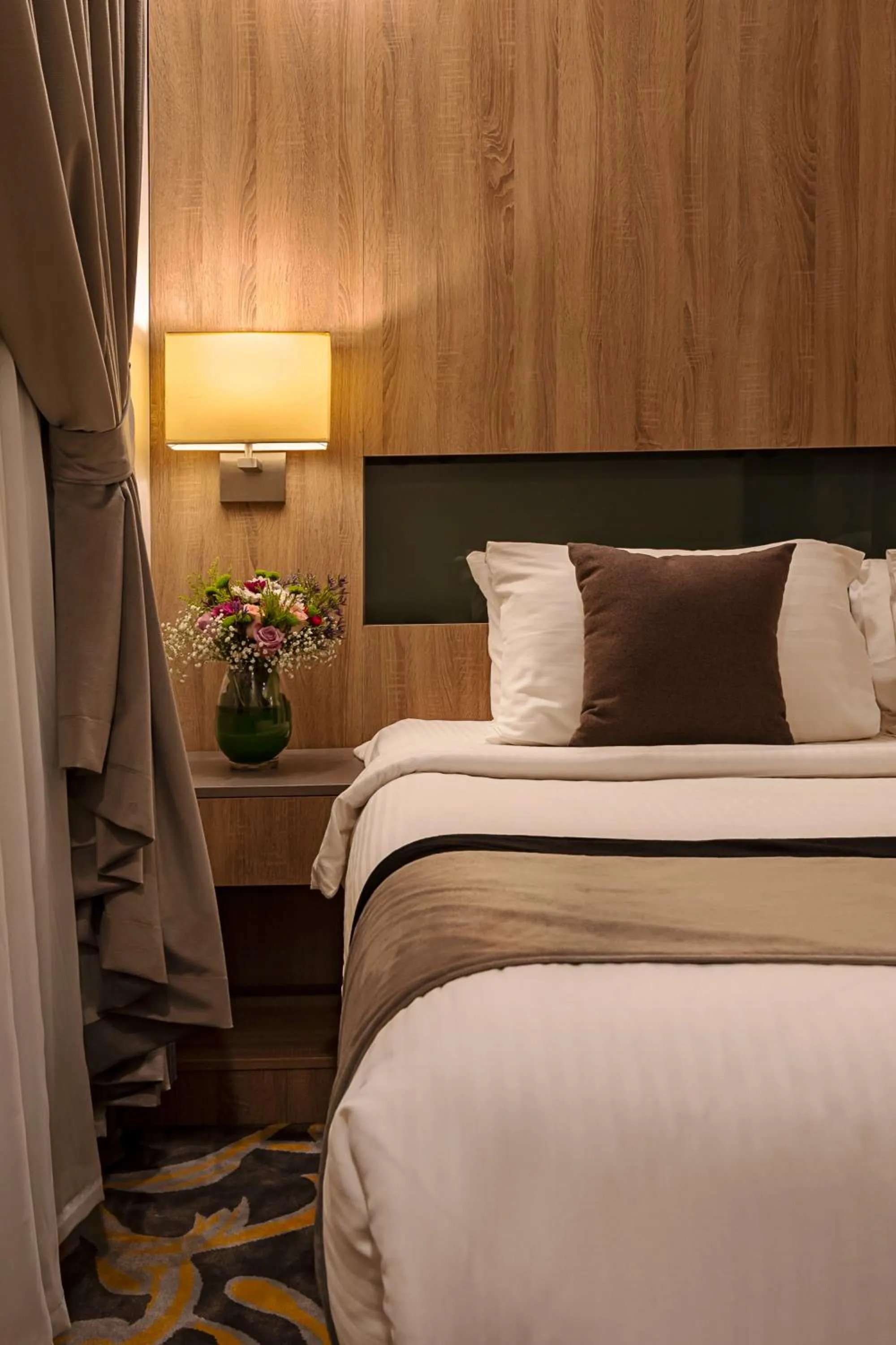 Bed in Laten Suites Prince Sultan