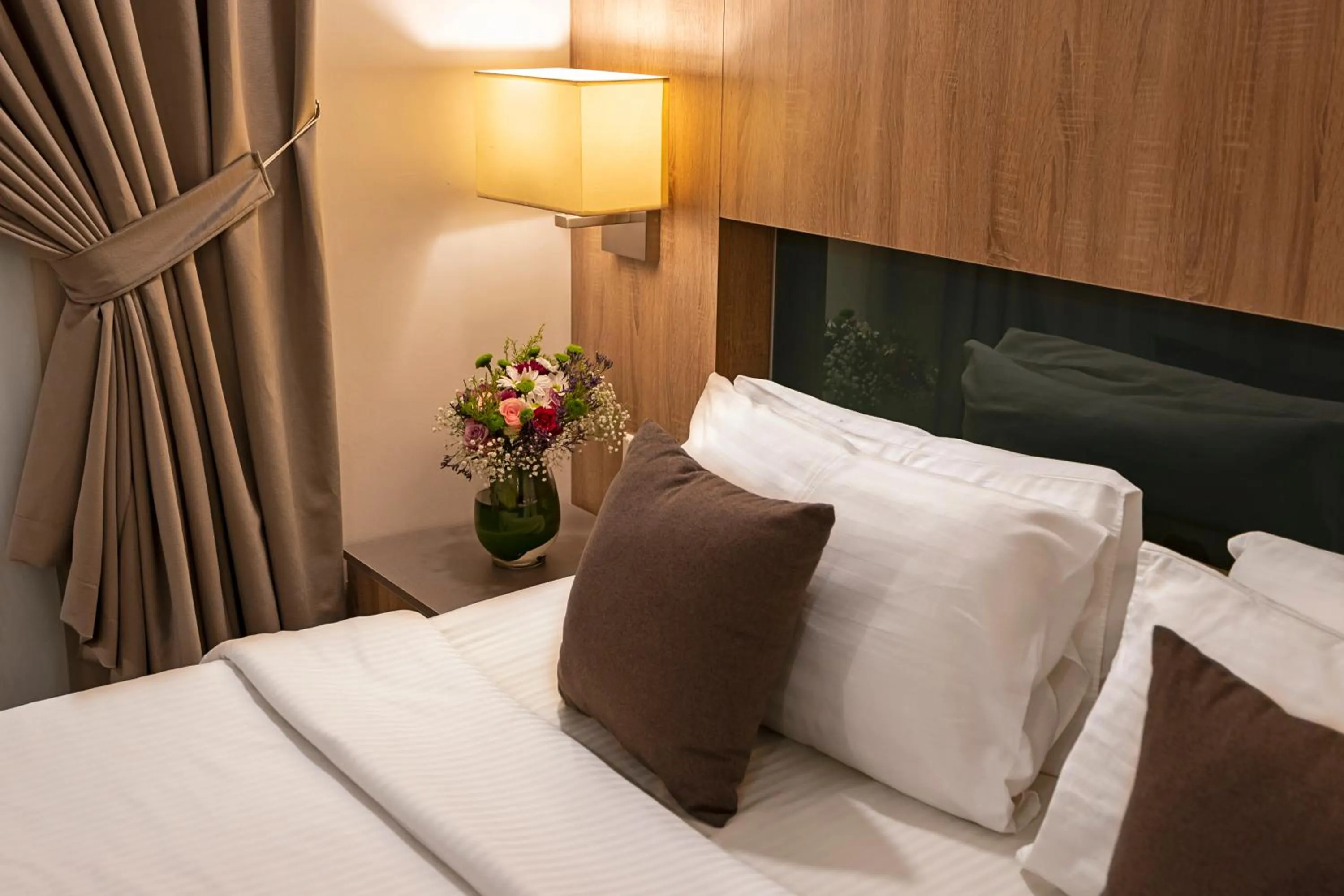 Bed in Laten Suites Prince Sultan