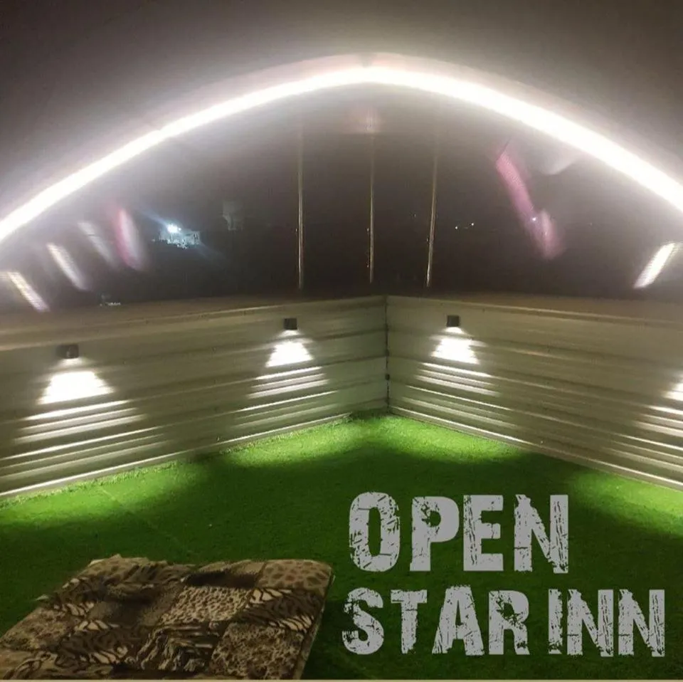 Property logo or sign in Hotel Star Inn