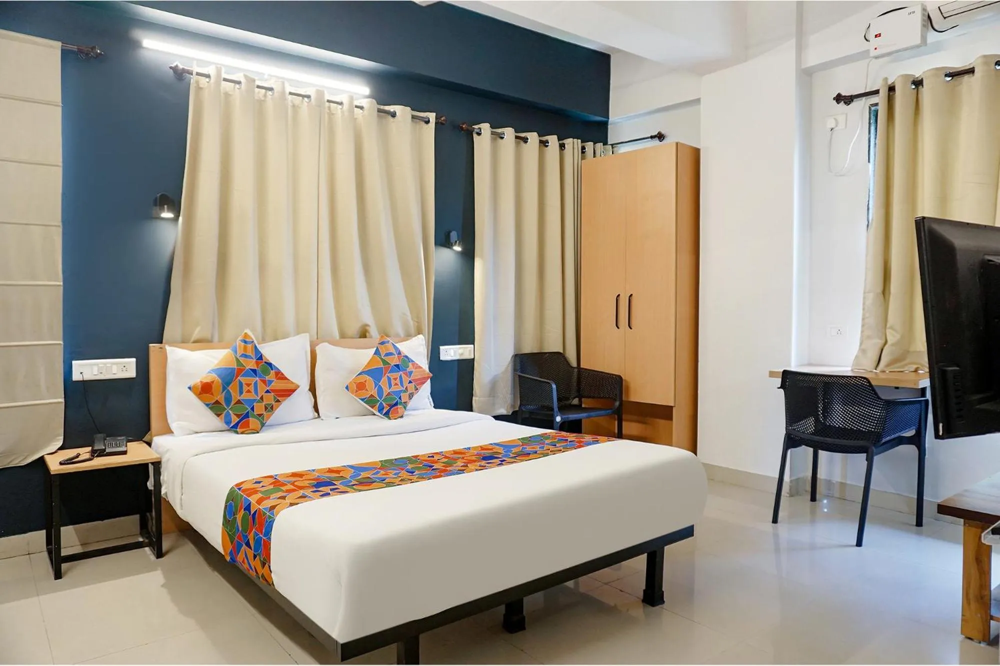 Bed in FabHotel Aura Homes - Nr Khandoba Mandir