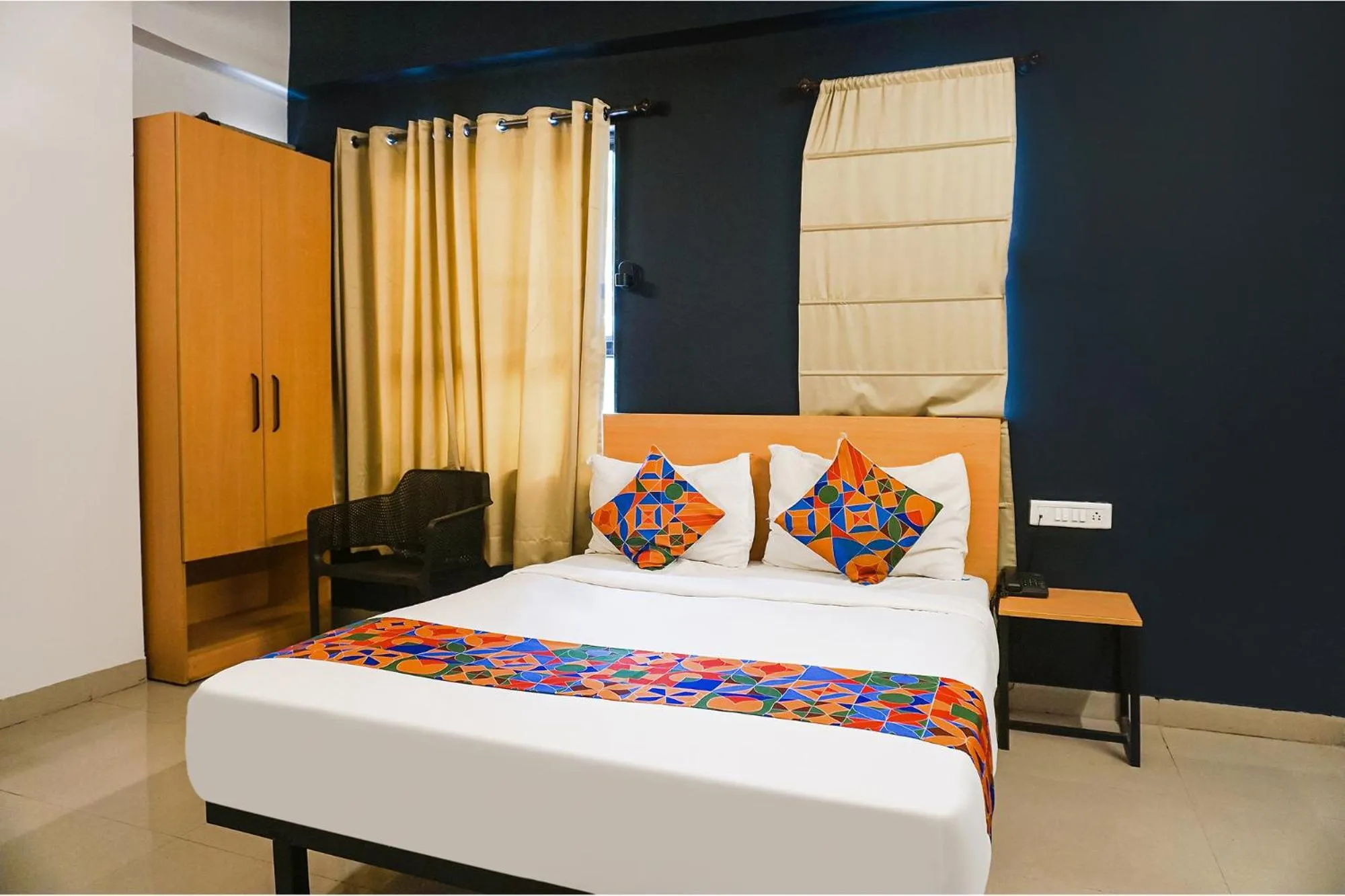 Bed in FabHotel Aura Homes - Nr Khandoba Mandir