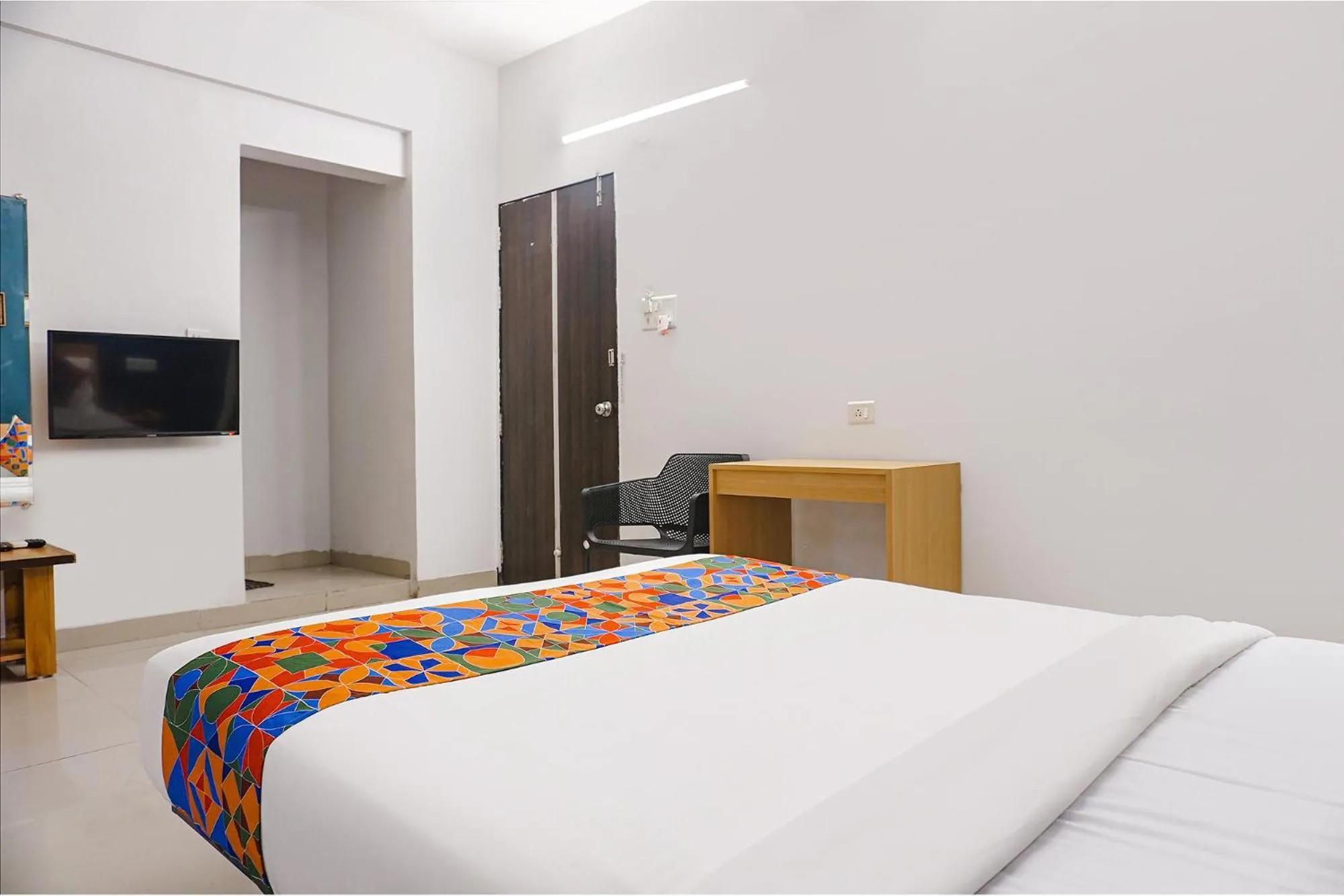 Bed in FabHotel Aura Homes - Nr Khandoba Mandir
