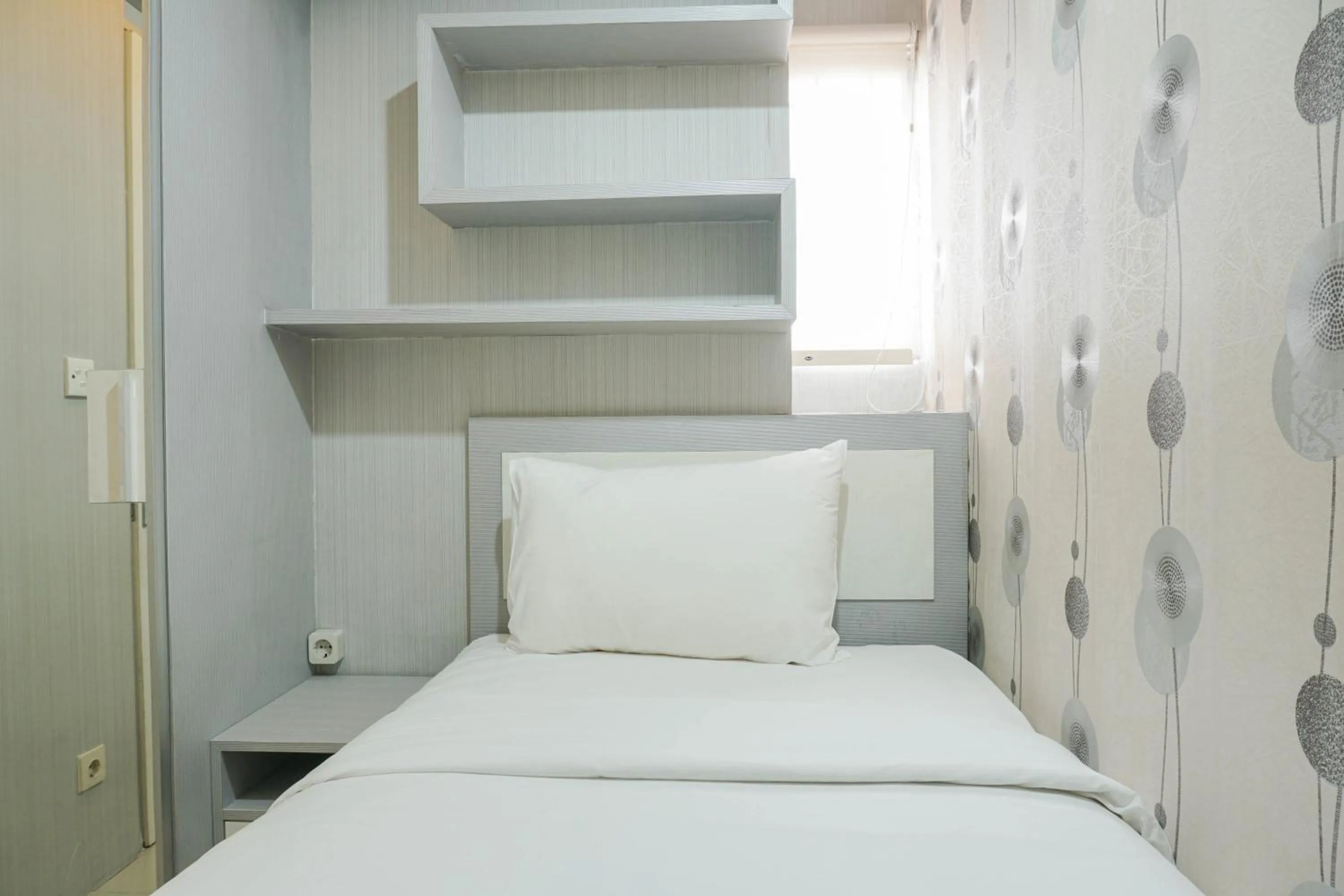 Bedroom in Beautiful and Comfy 2BR Menteng Square Apartment By Travelio