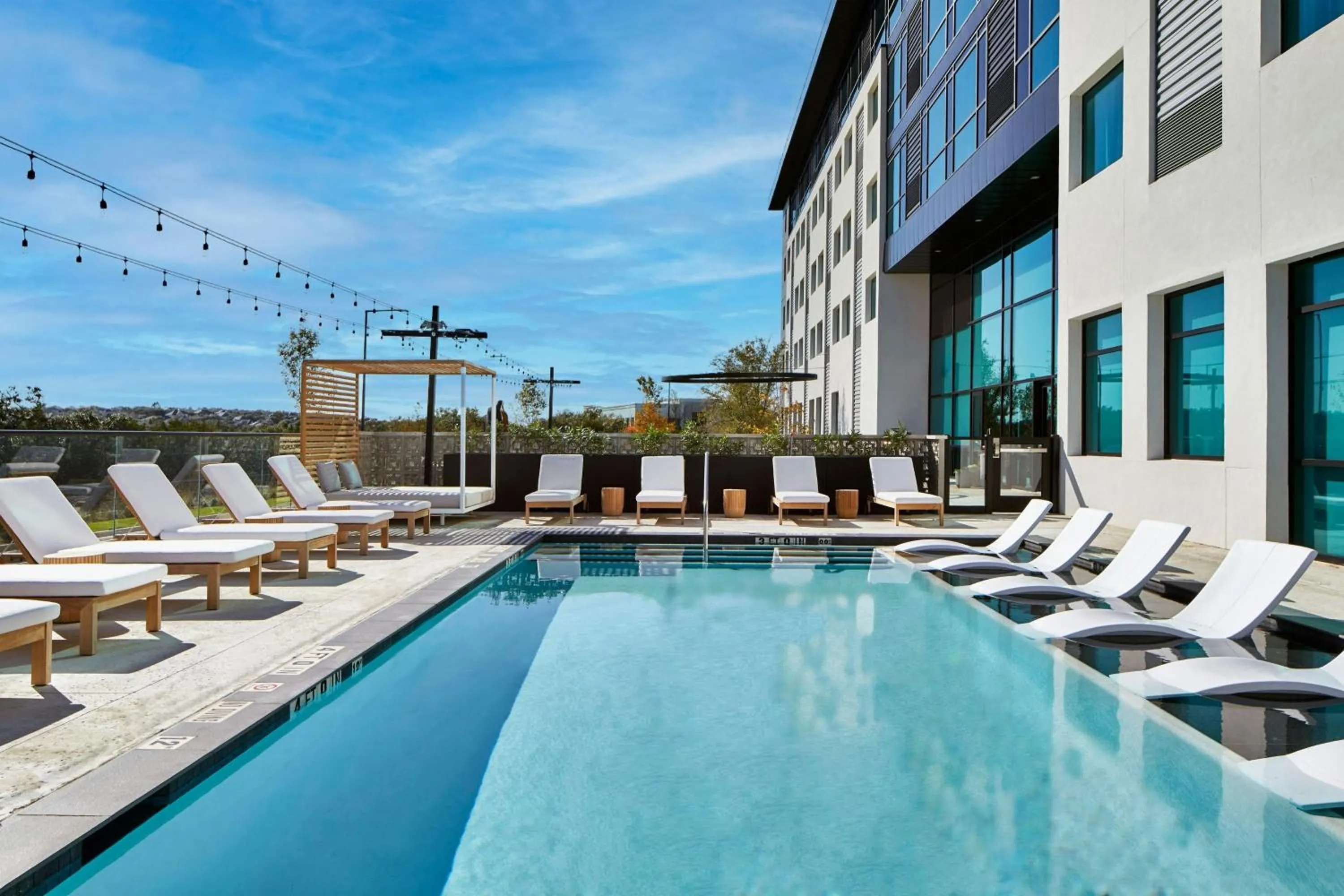 Swimming pool in AC Hotel by Marriott Austin Hill Country