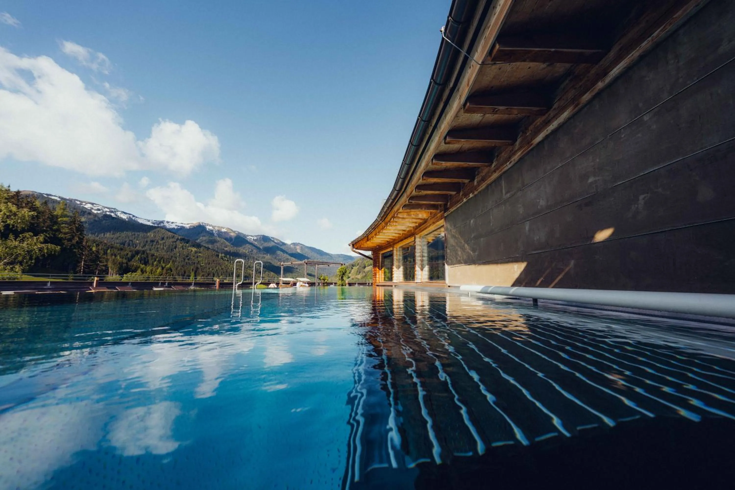 Pool view in Holzhotel Forsthofalm