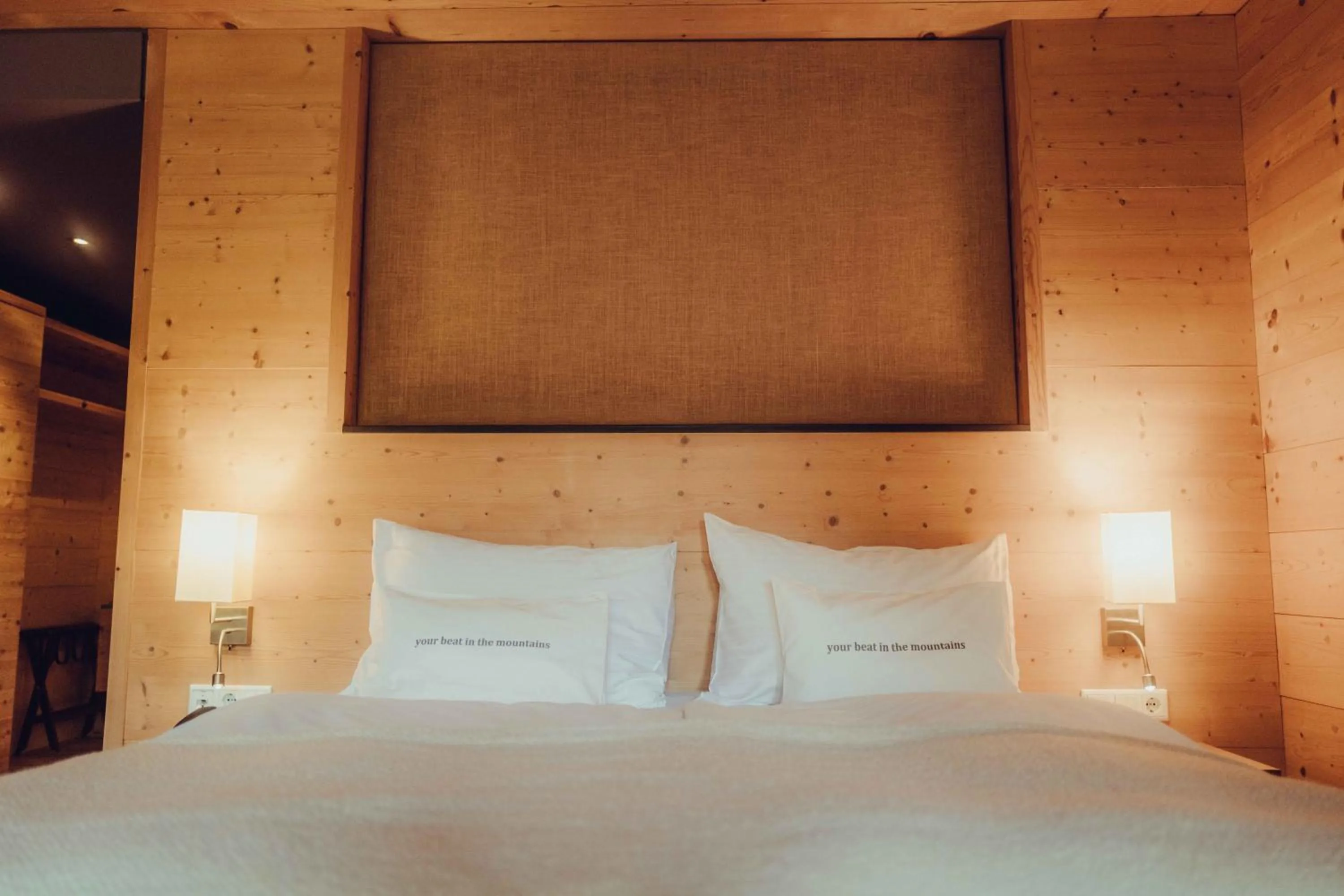 Bedroom, Bed in Holzhotel Forsthofalm