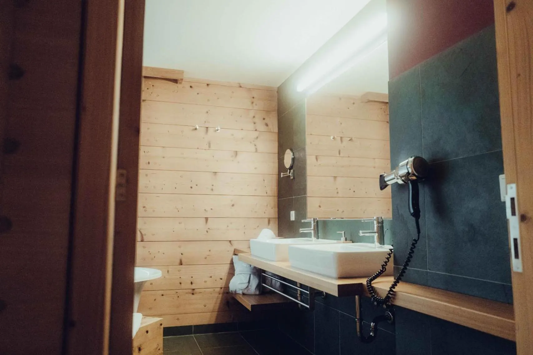 Bathroom in Holzhotel Forsthofalm