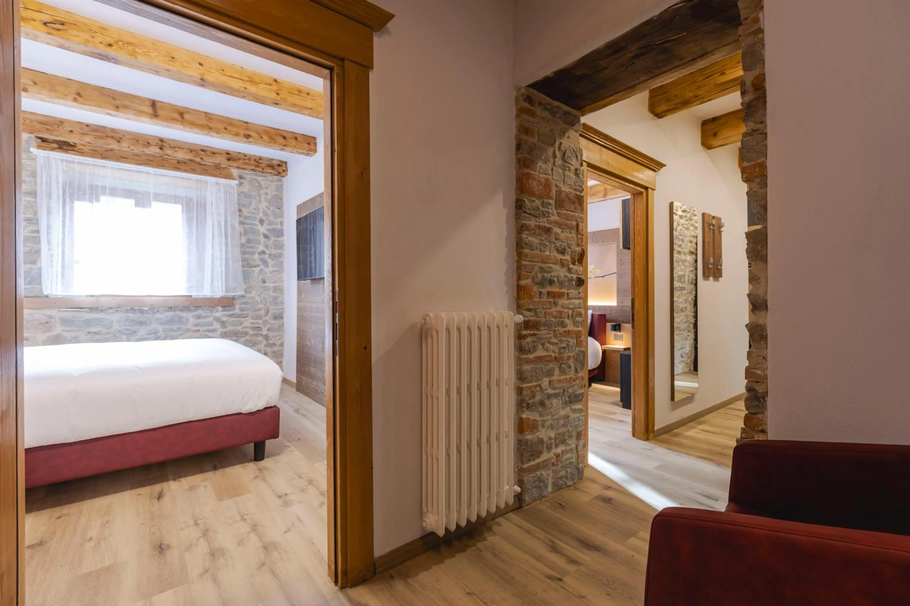 Bed in Granduca Mountain Wellness Apartments Campigna