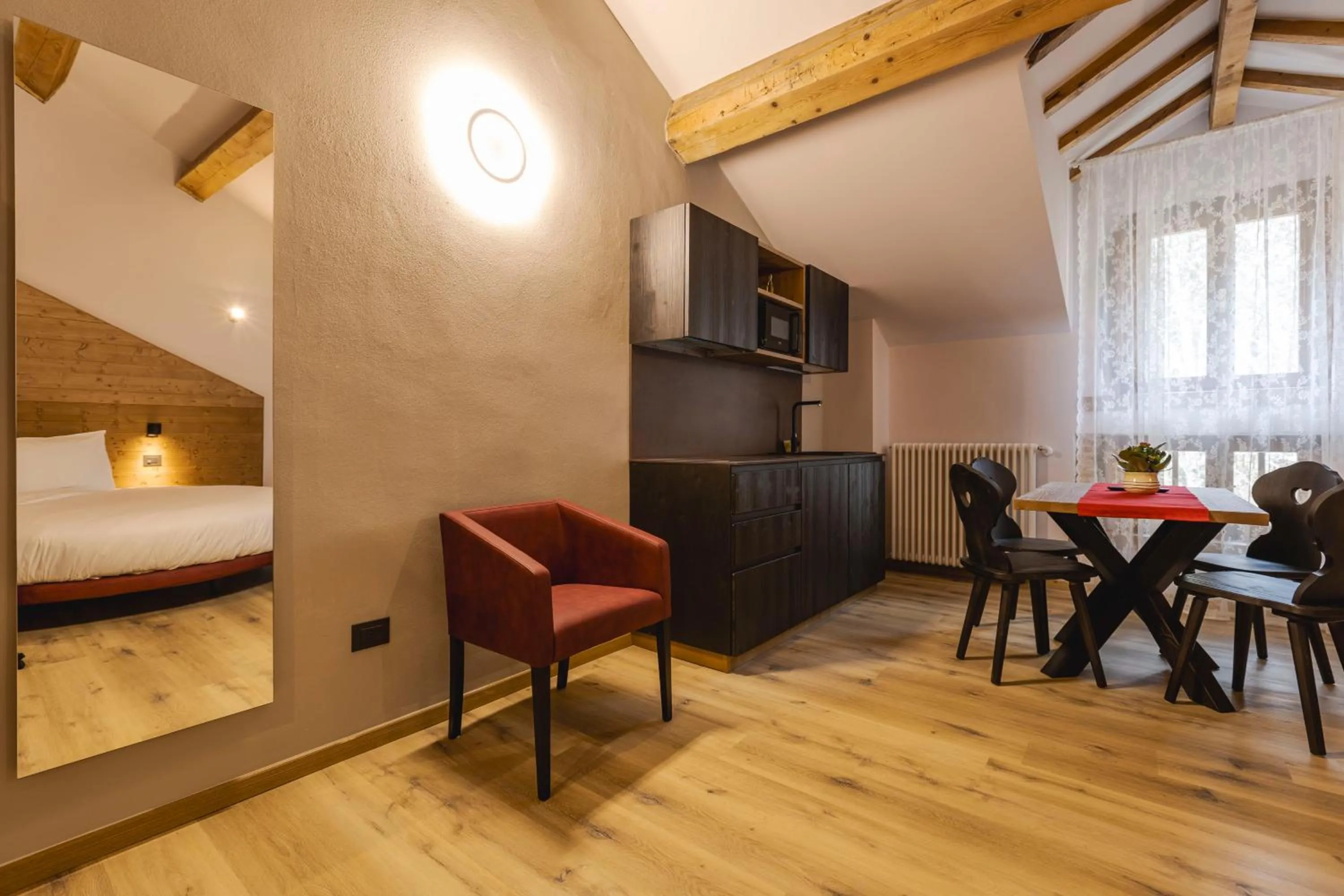 Kitchen or kitchenette, Bed in Granduca Mountain Wellness Apartments Campigna