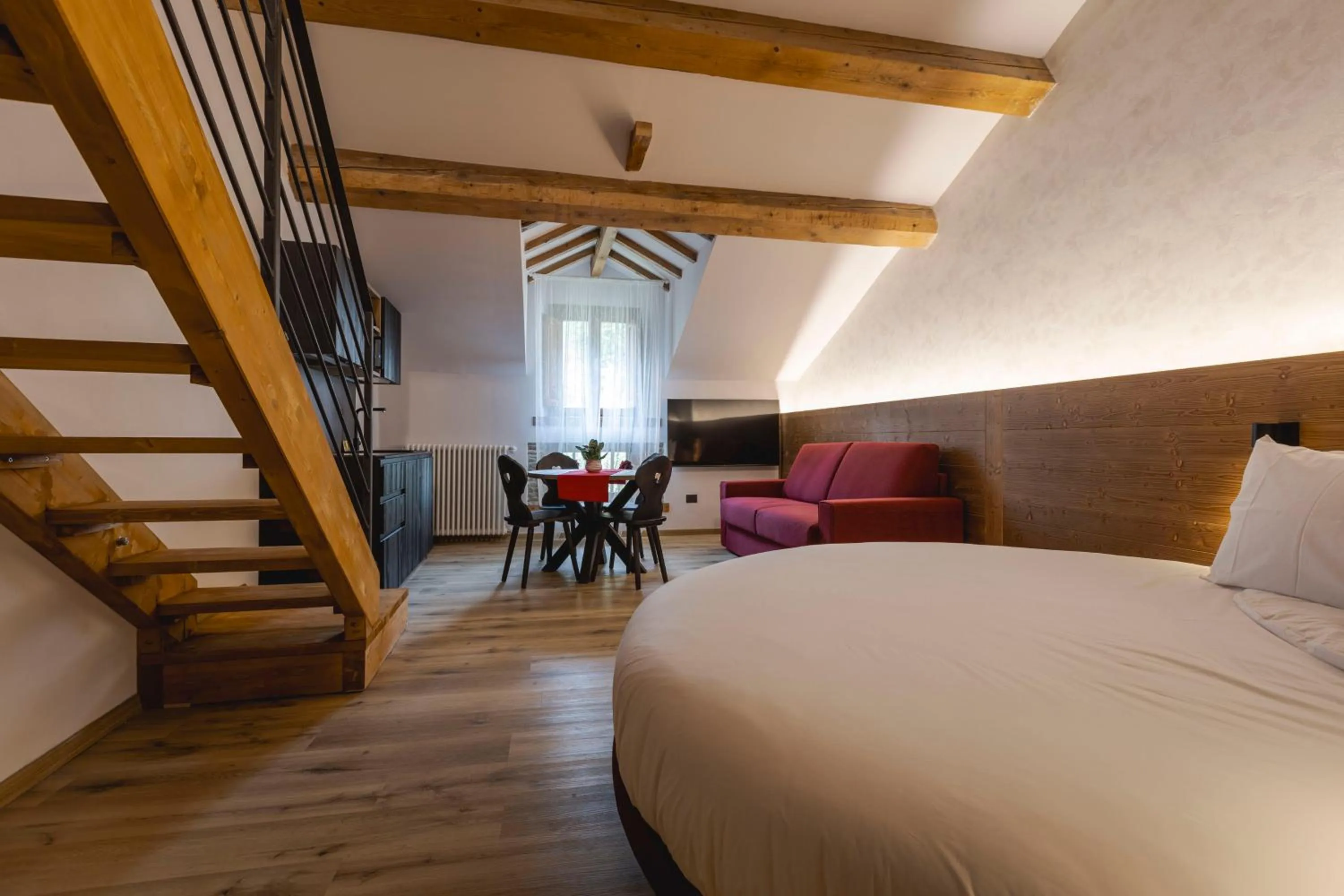 Bed in Granduca Mountain Wellness Apartments Campigna