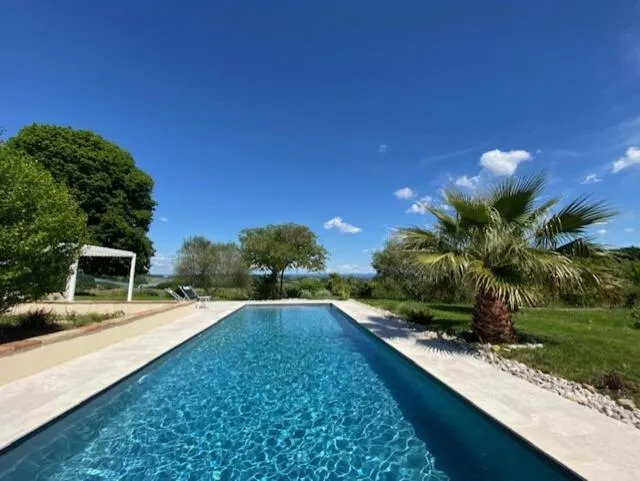 Pool view in Aux Coteaux d'Aussac