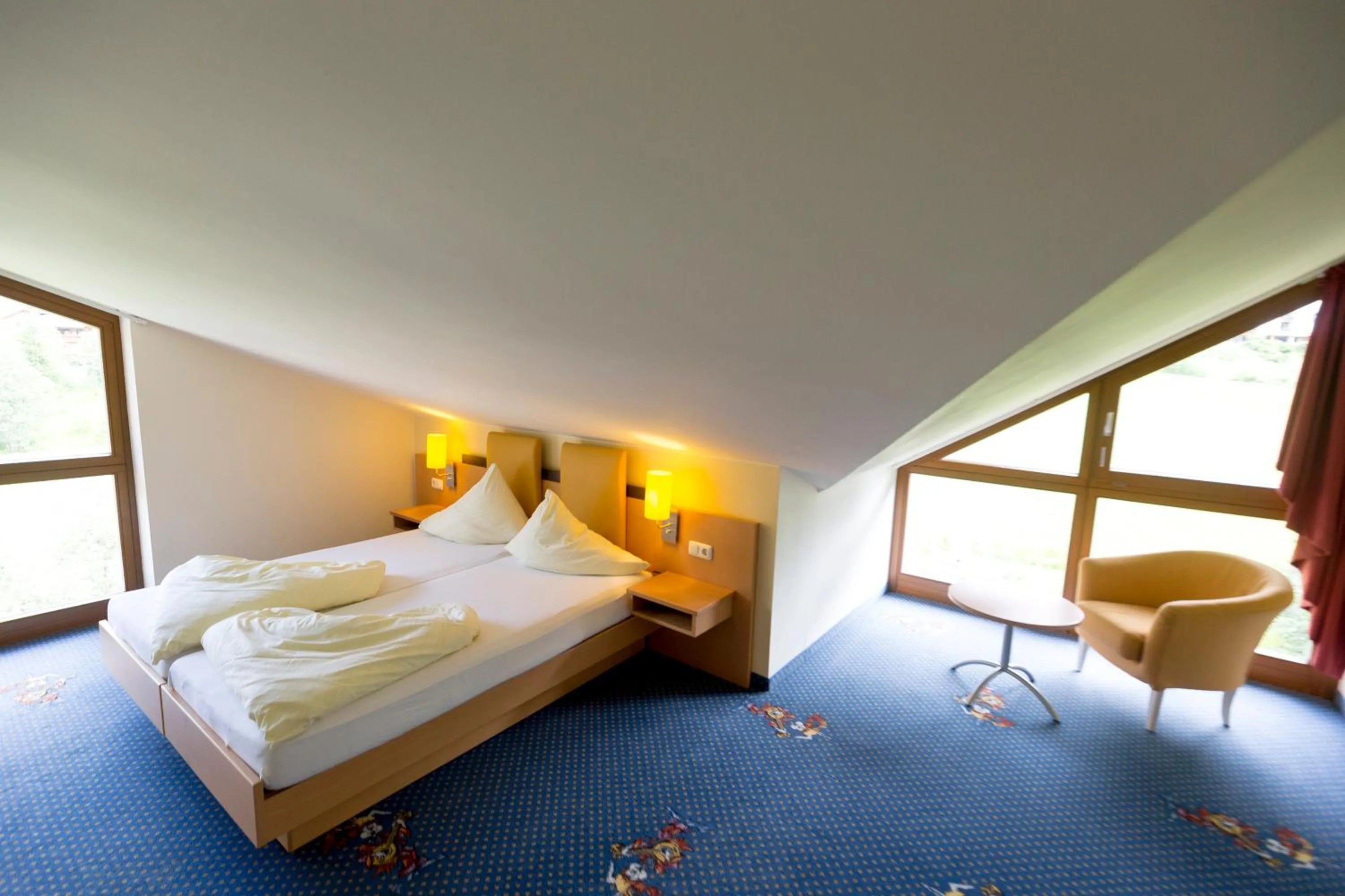 Photo of the whole room, Bed in Family & Sporthotel Kärntnerhof