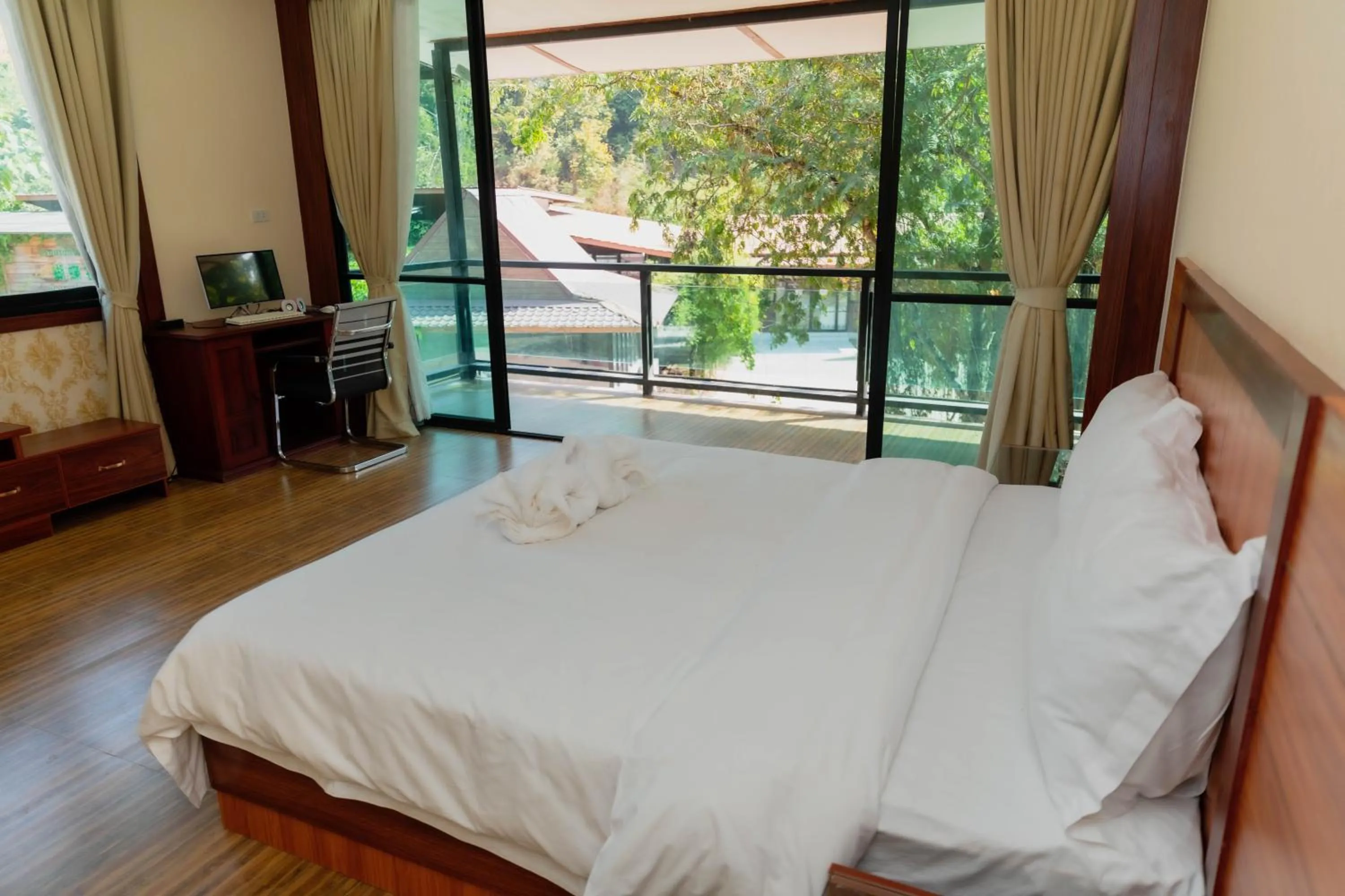 Bed in Dansavanh Namngum Resort